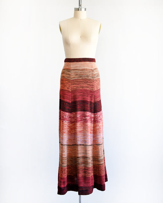 a vintage 1970s striped space dye maxi skirt on a mannequin against a white background