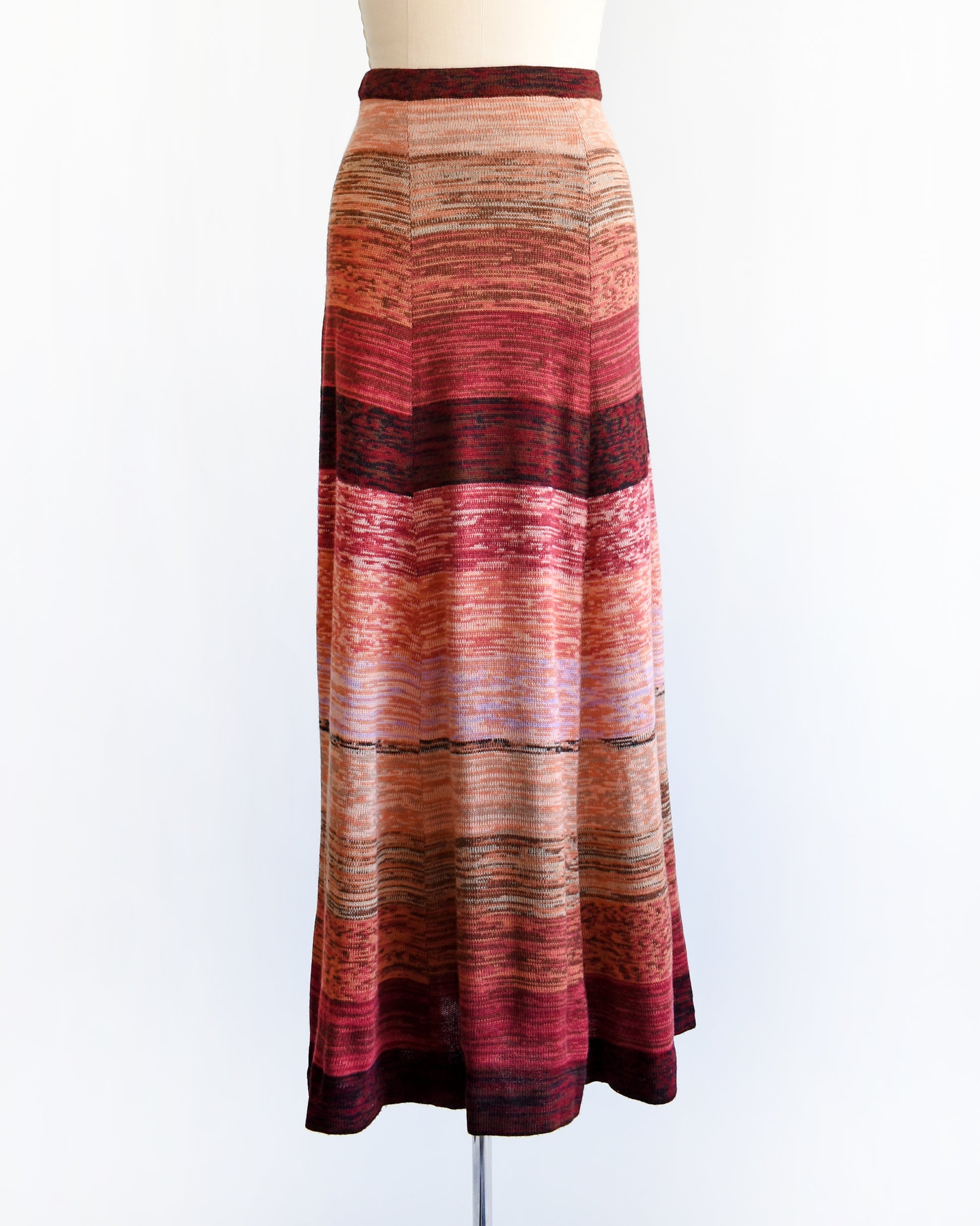 a vintage 1970s striped space dye maxi skirt on a mannequin against a white background
