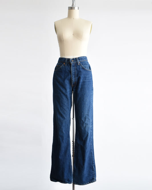 vintage 1980s orange tab book cut 517 Levi's on a mannequin on a dress form