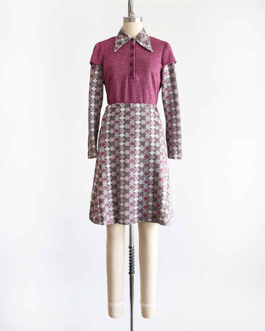 a vintage 1970s dress set that has a purple top and patterned skirt on a mannequin against a white background