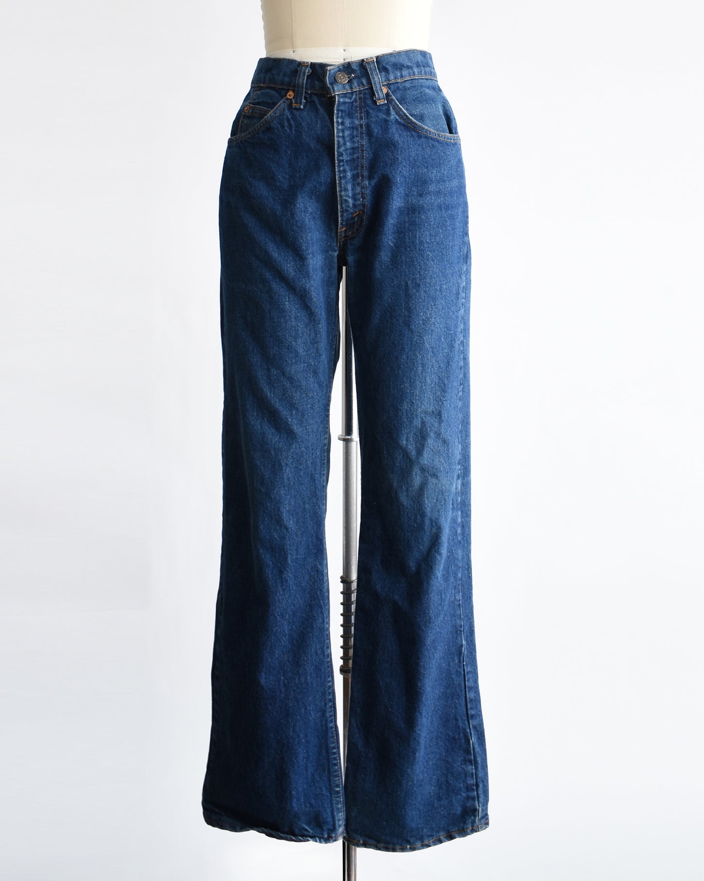 vintage 1980s orange tab book cut 517 Levi's on a mannequin on a dress form