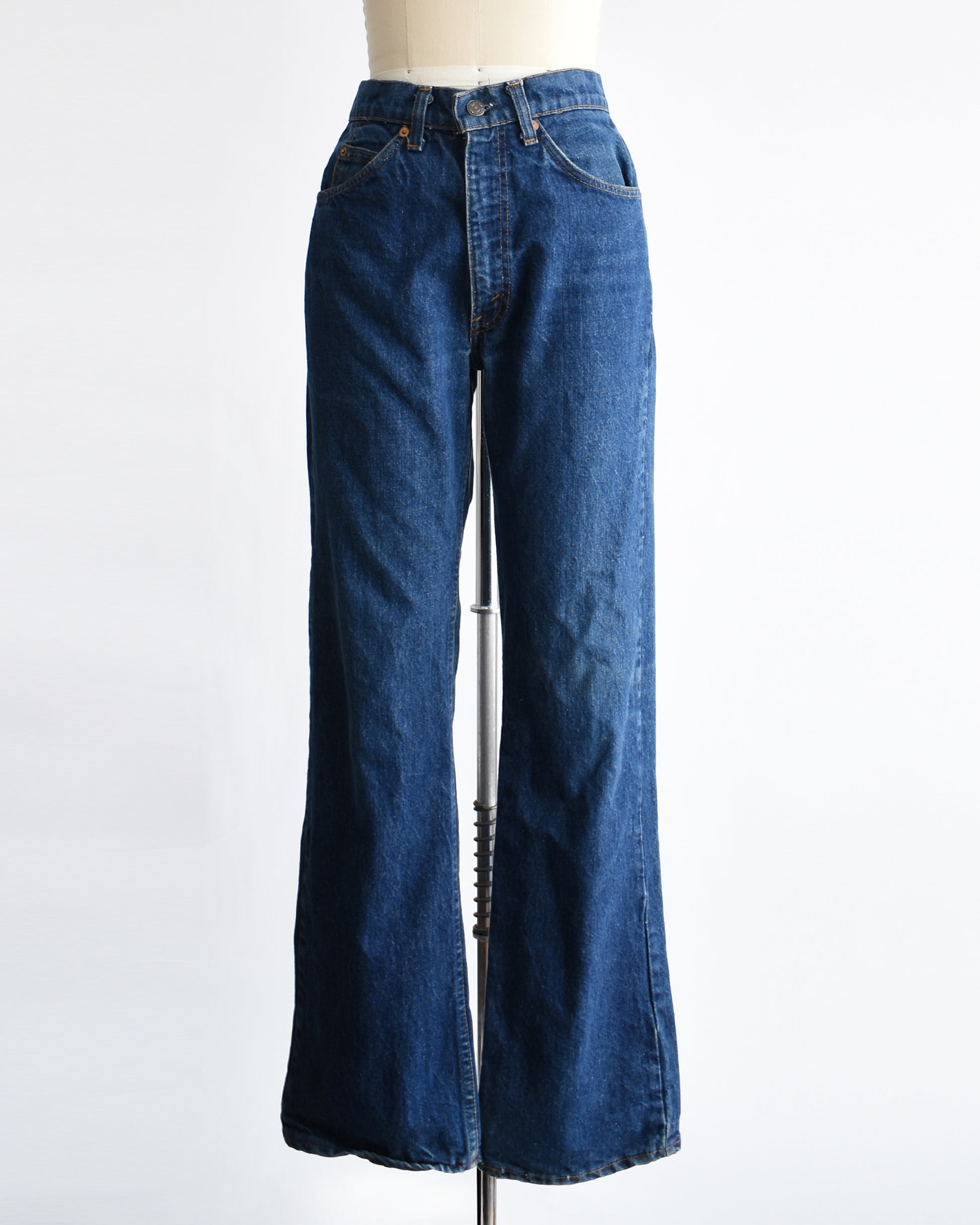 vintage 1980s orange tab book cut 517 Levi's on a mannequin on a dress form