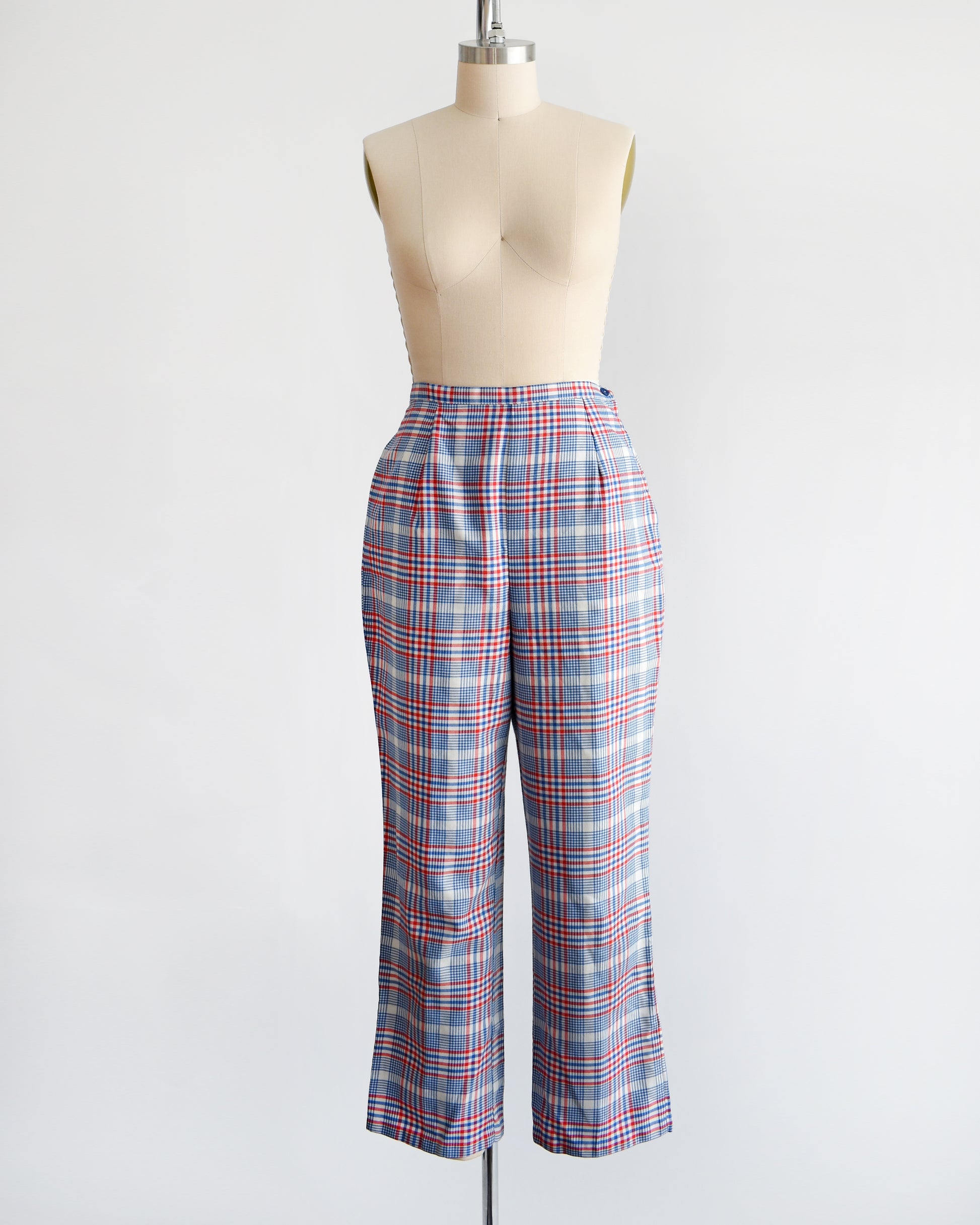 vintage 1970s red white and blue plaid pants on a dress form