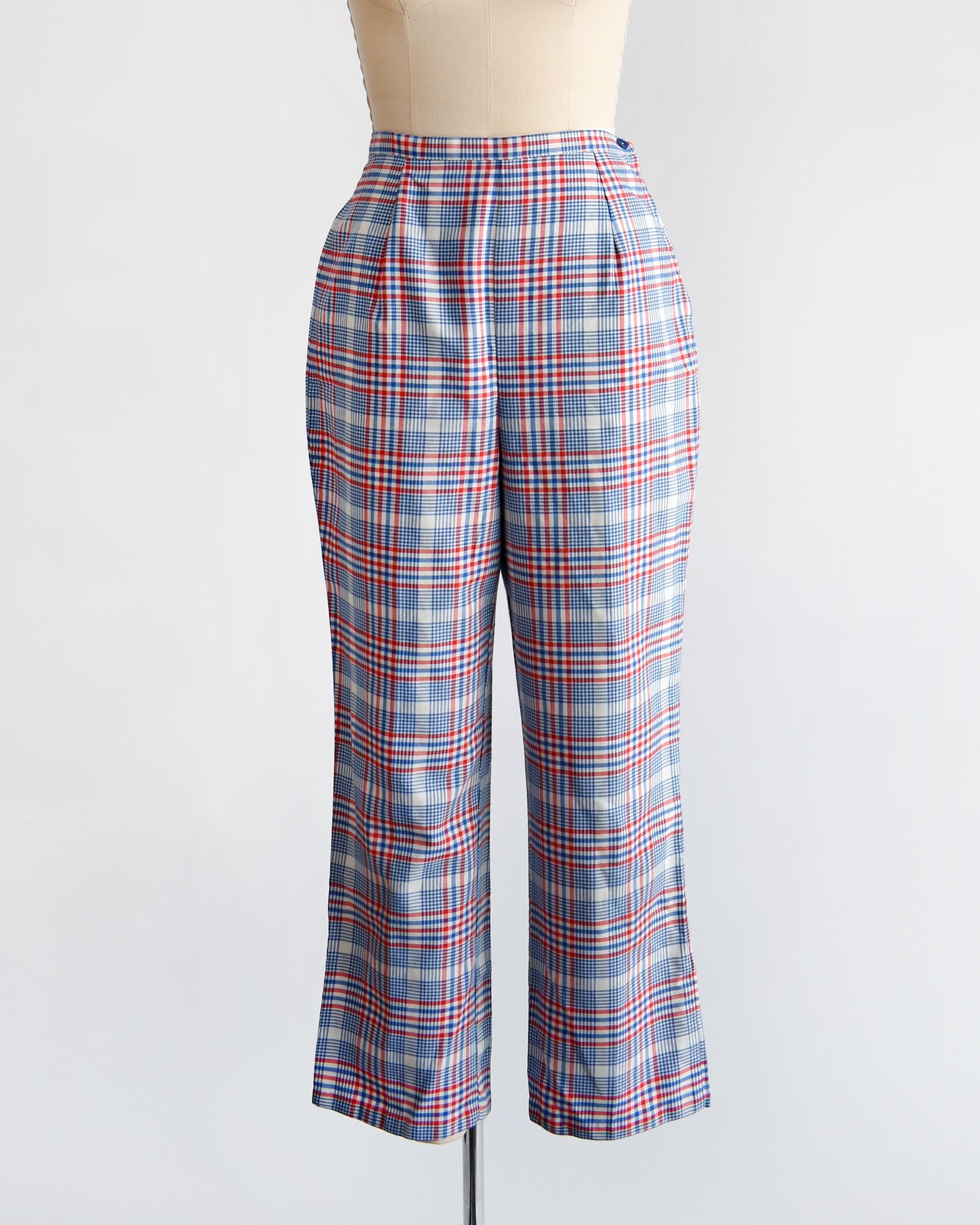 vintage 1970s red white and blue plaid pants on a dress form