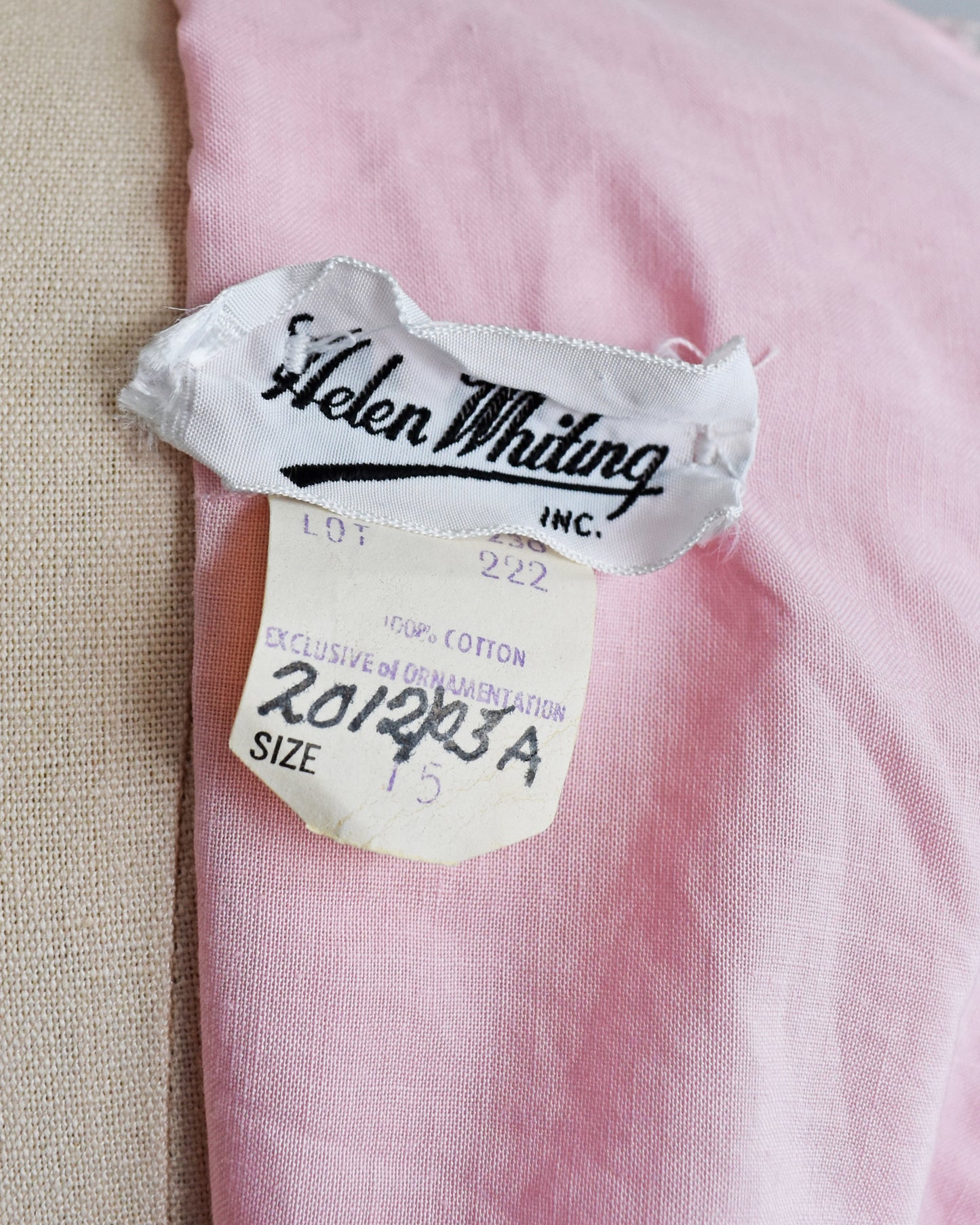 close up of the tag which says Helen Whiting Inc