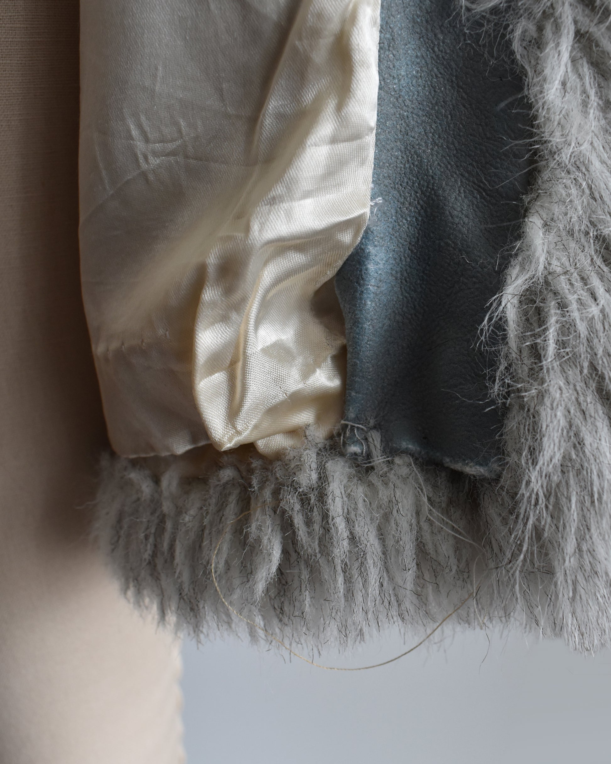 close up of the right hem which shows some undone stitching