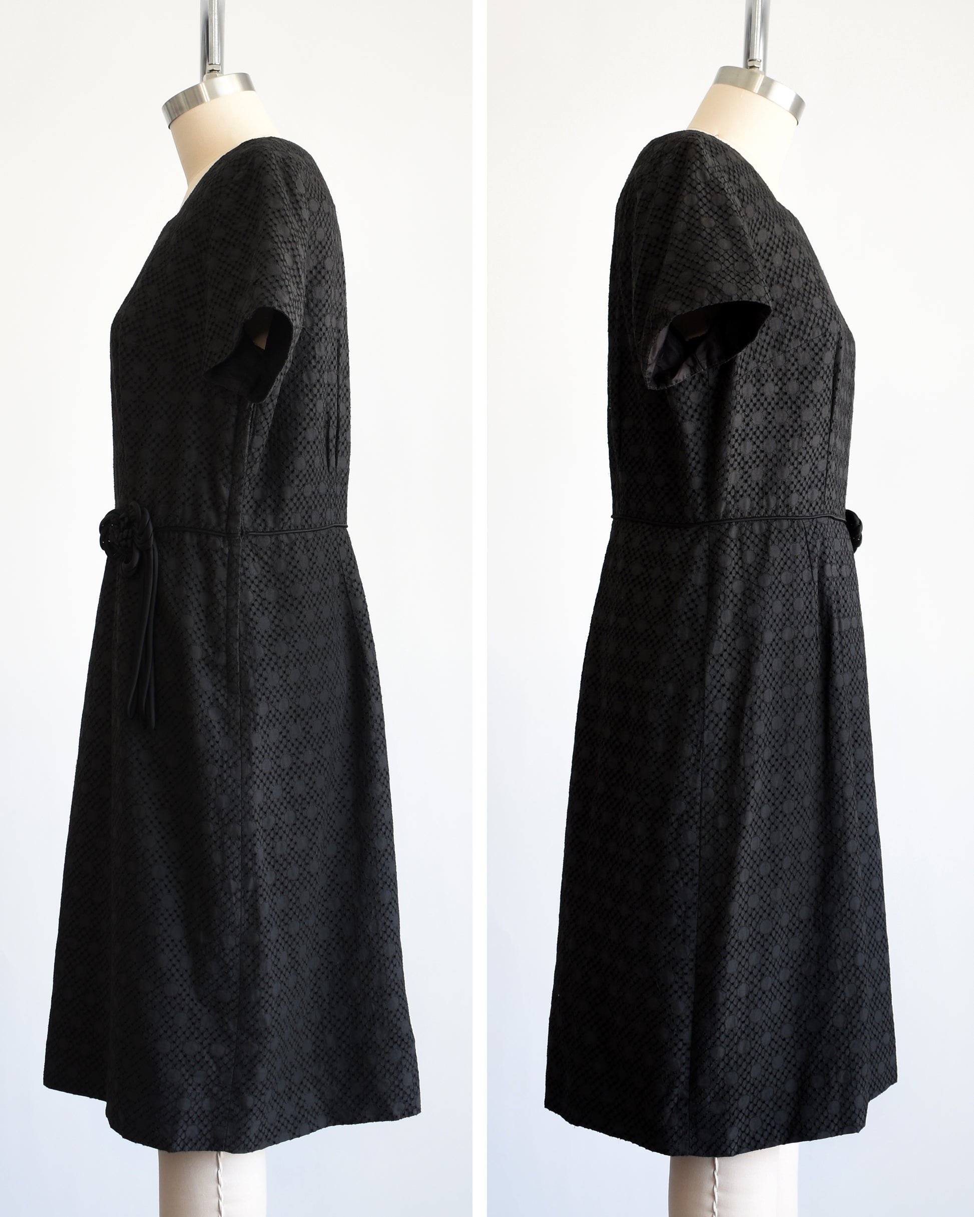 side by side view of the side of a vintage 1960s black eyelet dress on a mannequin on a dress form