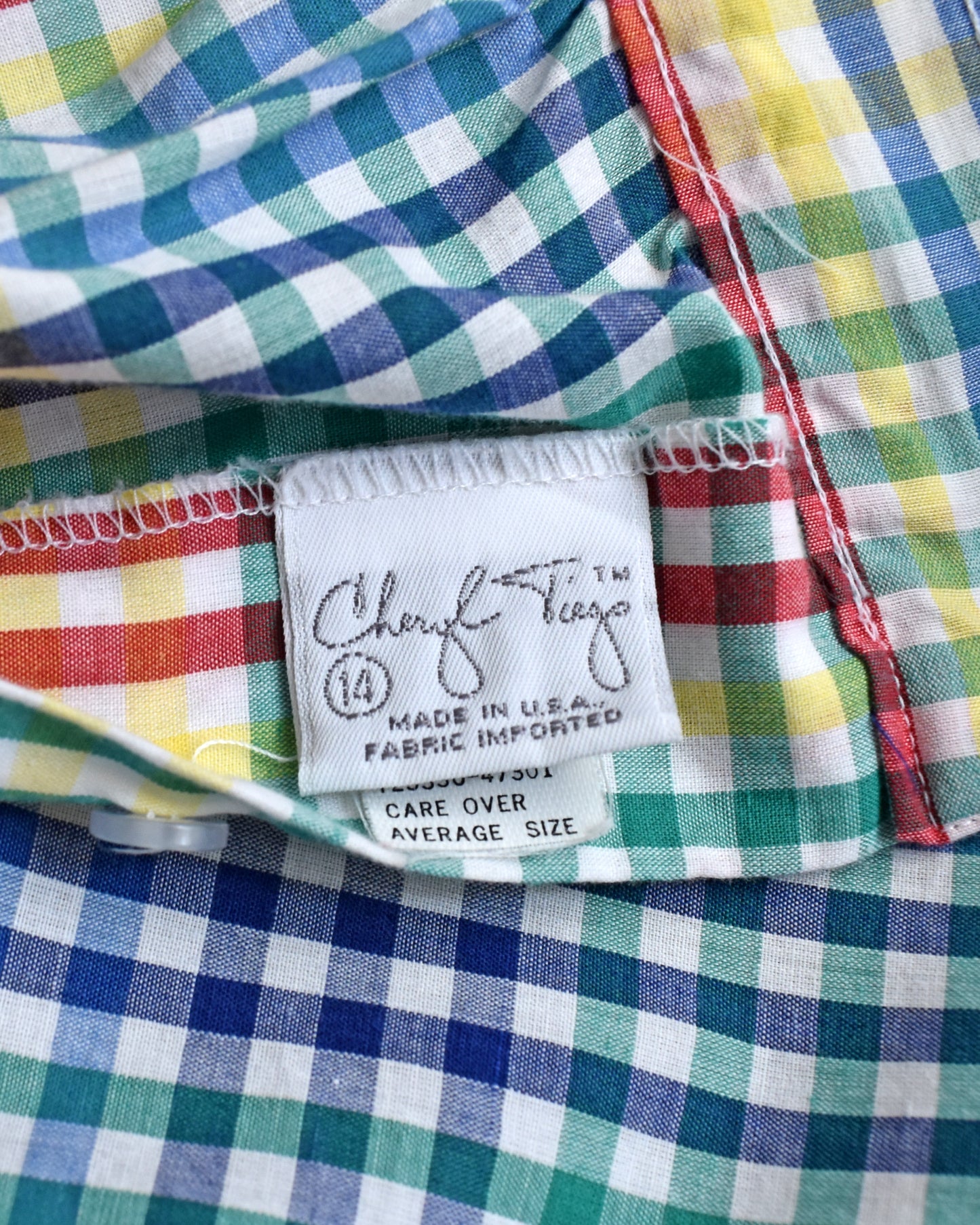 close up of the label which says 'Cheryl Tiegs'