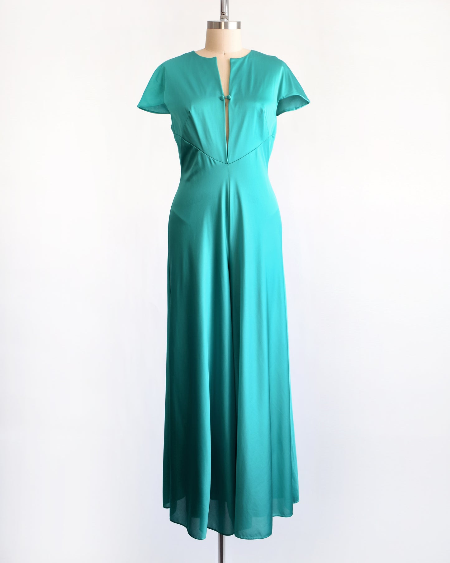 a vintage 1970s teal palazzo jumpsuit by Vanity Fair