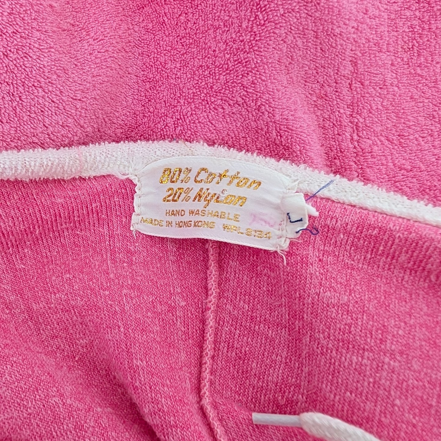 Close-up of the tag which reads '90% Cotton 20% Nylon' and 'HAND WASHABLE'.