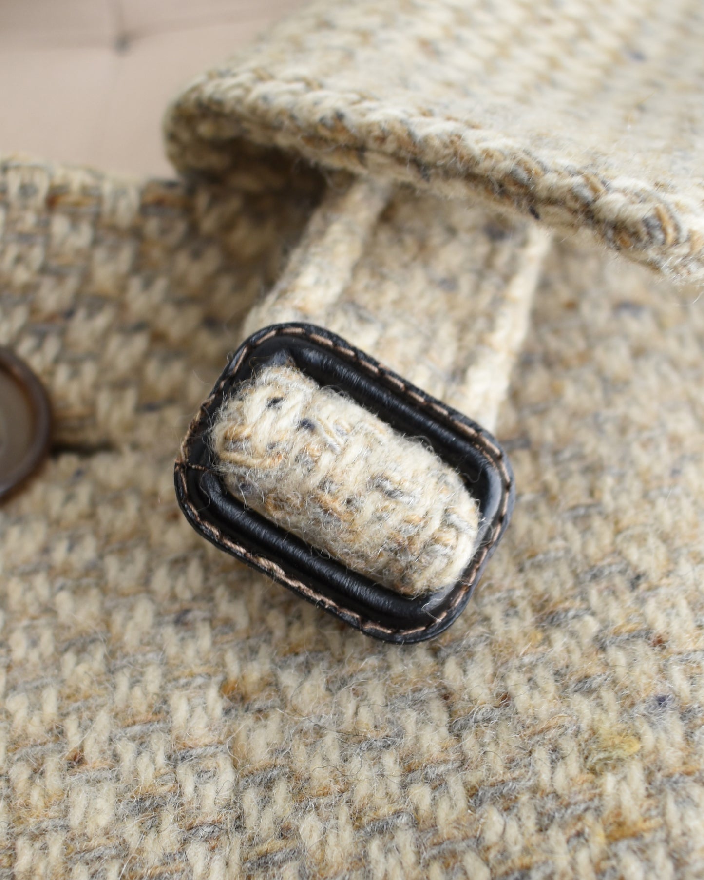 close up of the buckle on the neck