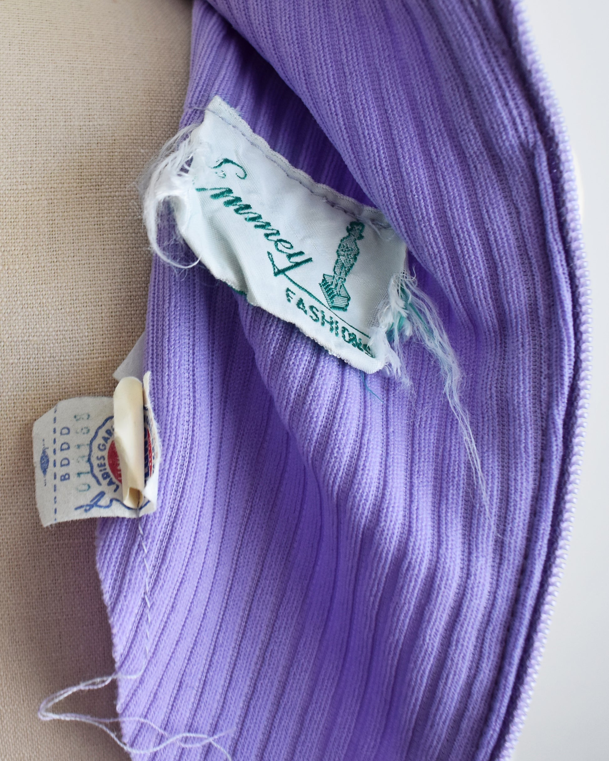 close up the  Emmey Fashions label 