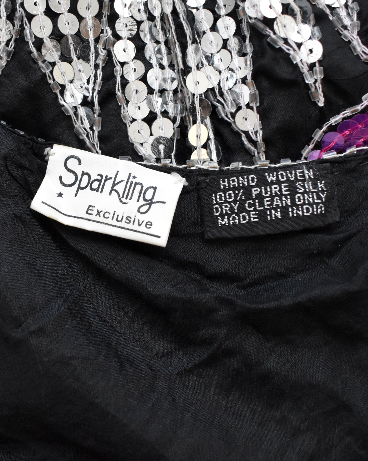 close up of the label which says 'Sparkling Exclusive' and product details.