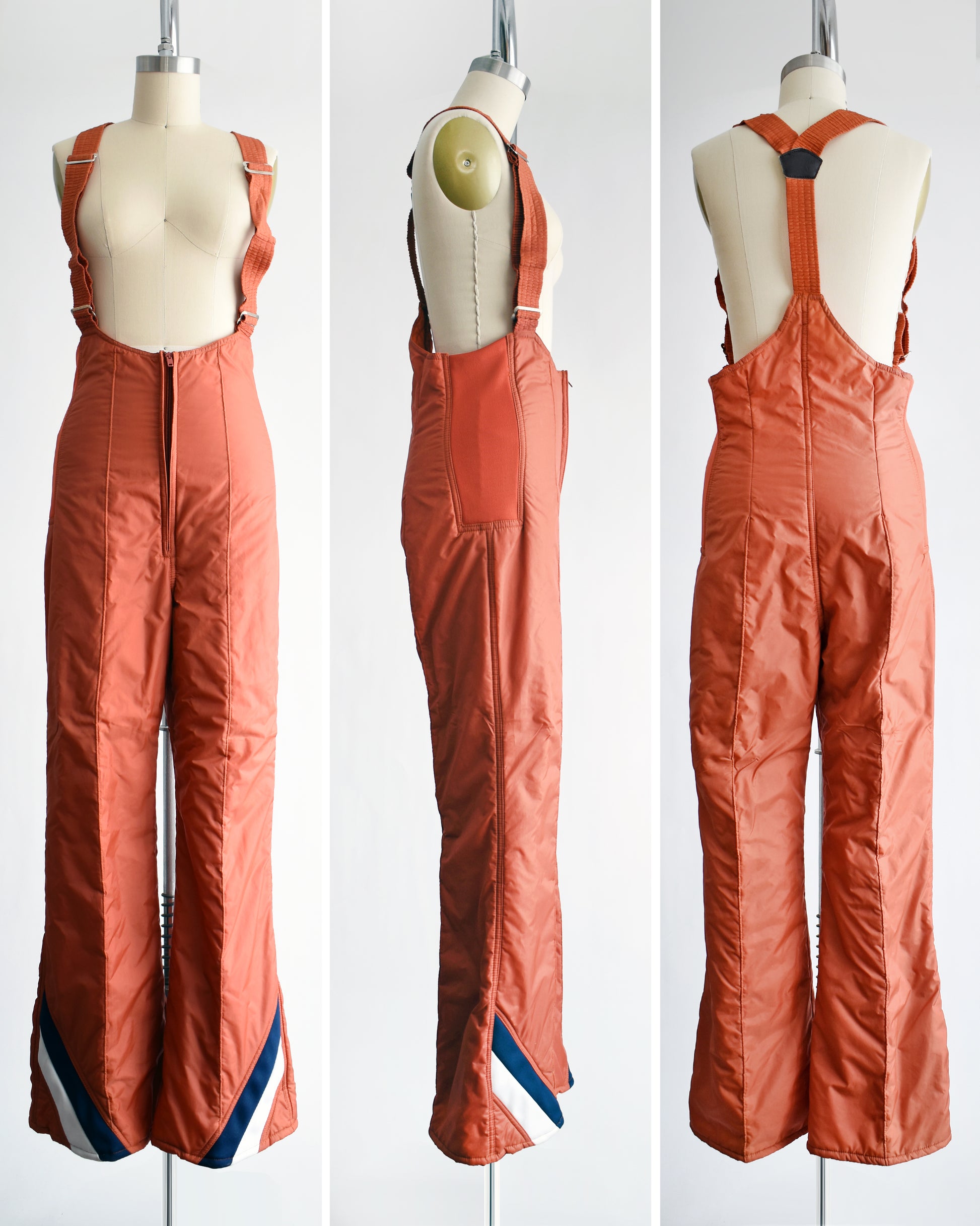 side by side views of the front, side, and back of the bibs of a vintage 1970s orange winter ski suit on a mannequin against a white background