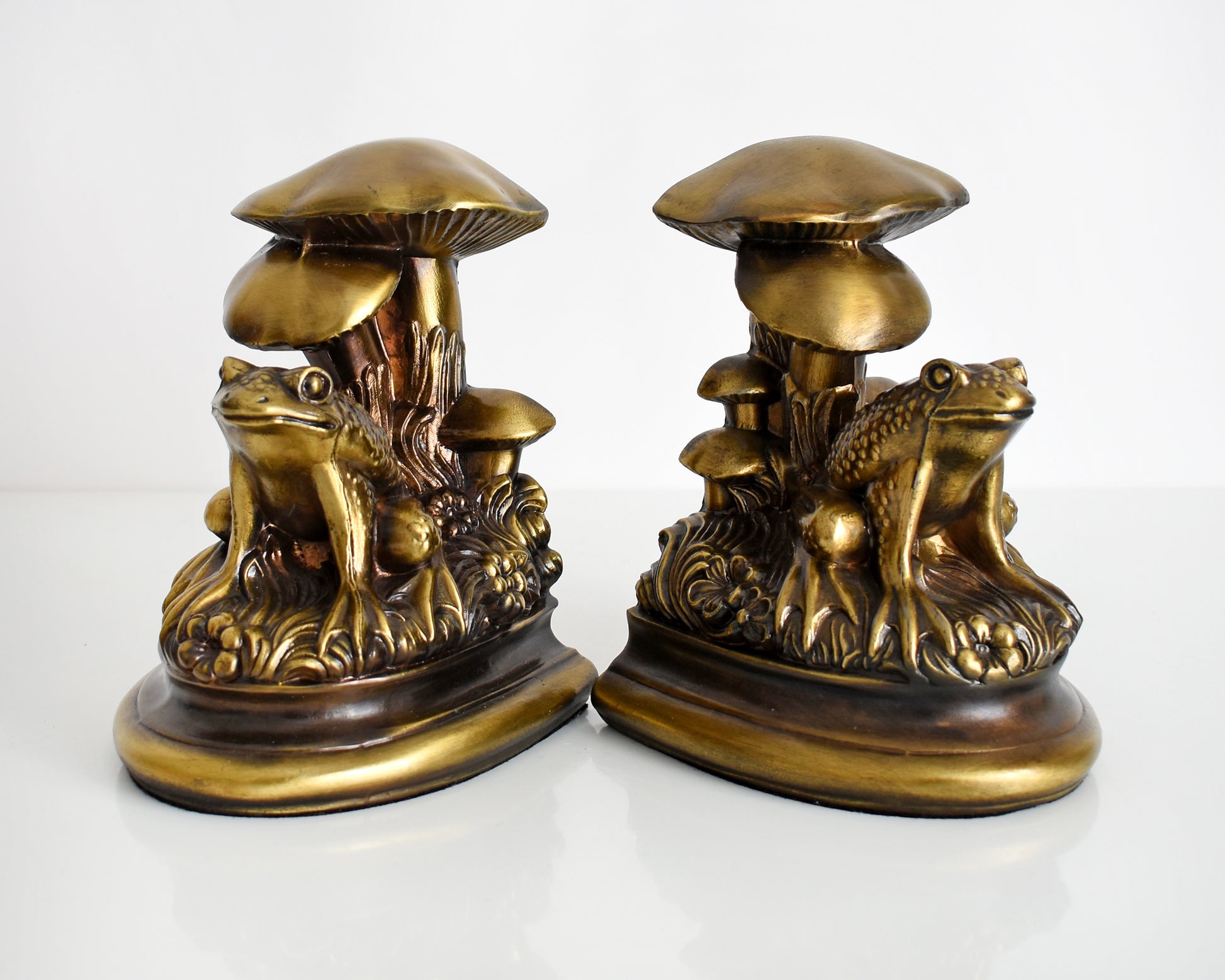A pair of vintage brass frog and mushroom bookends