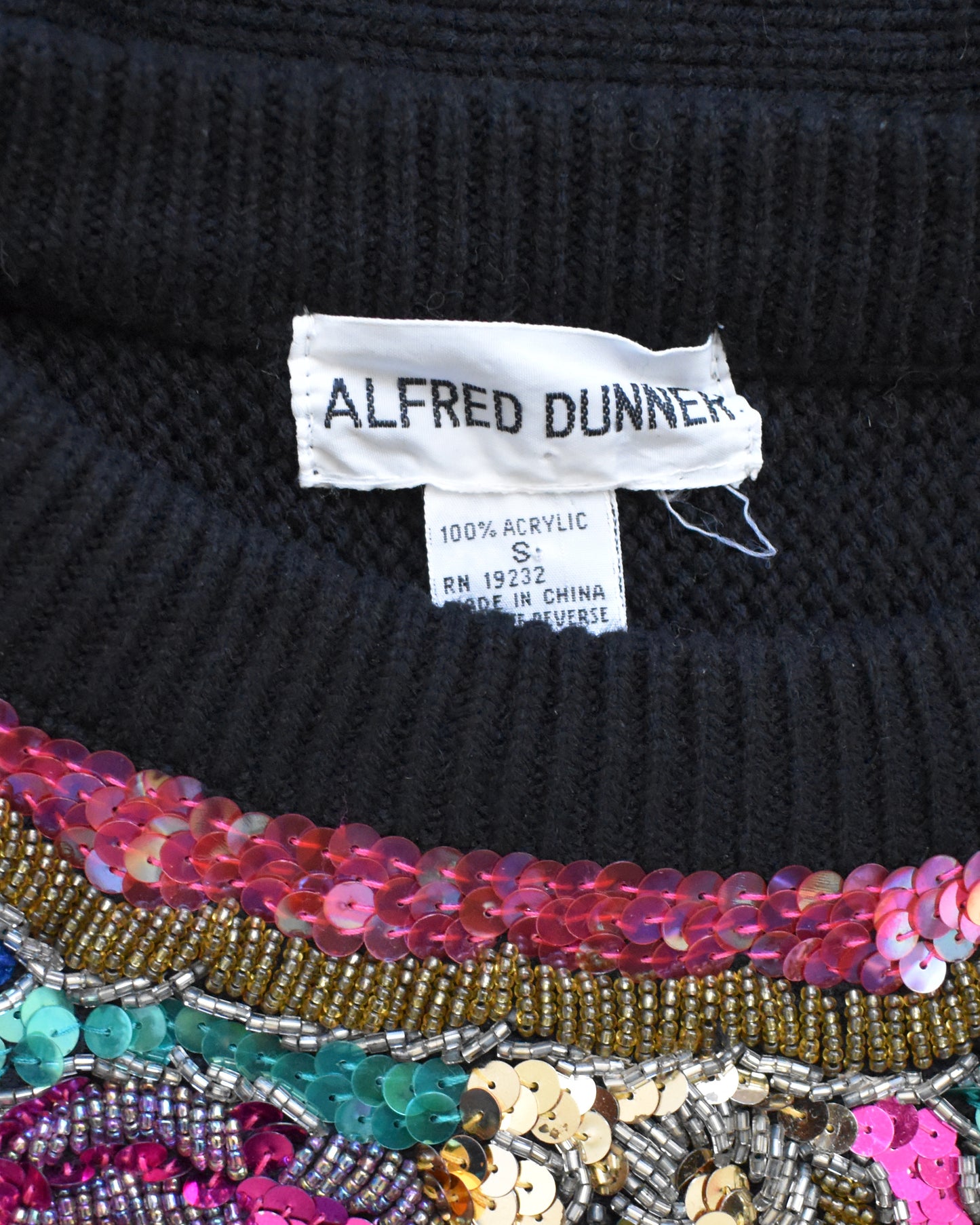 Black sweater with colorful sequin trim and Alfred Dunner label