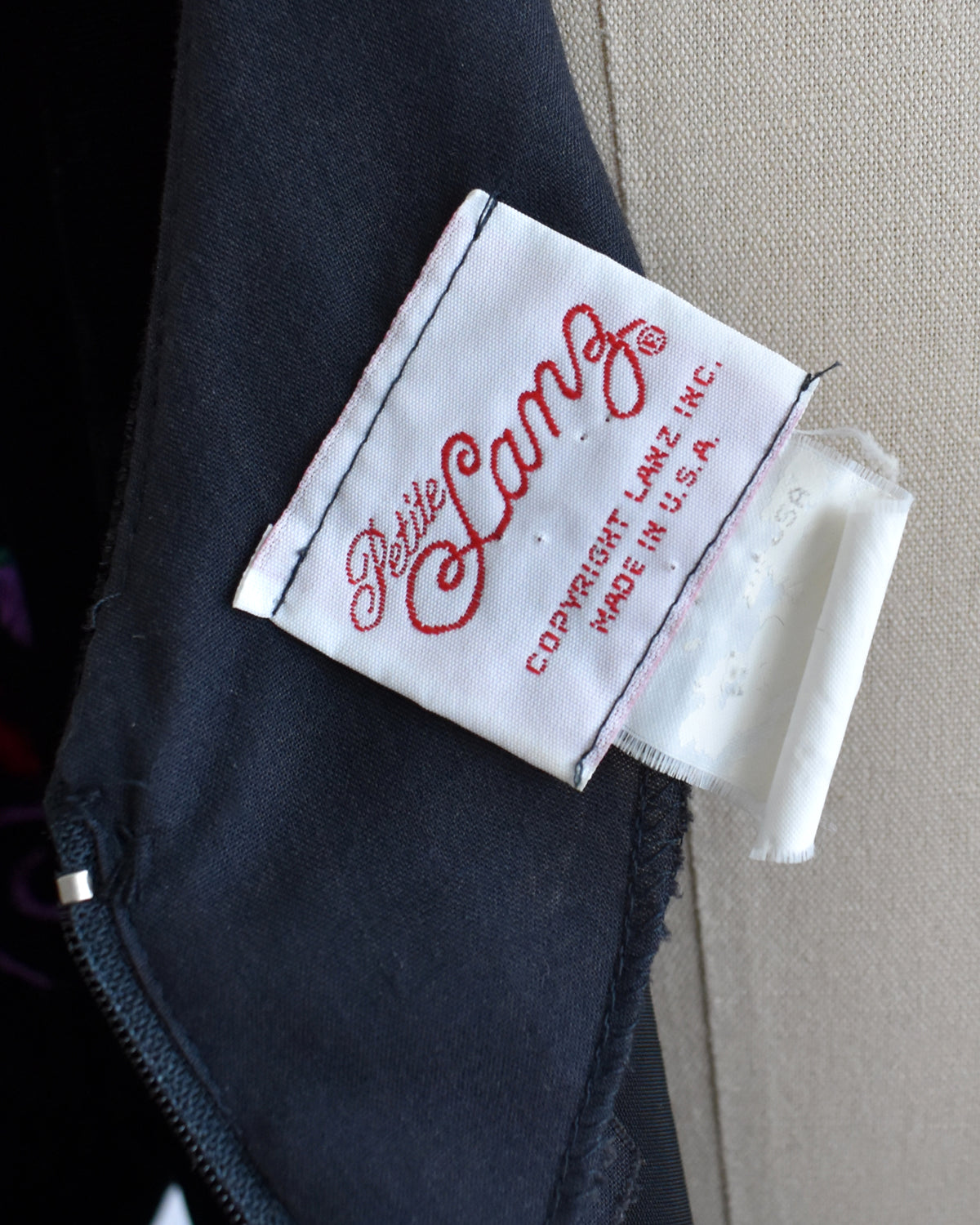 close up of the Petite Lanz label