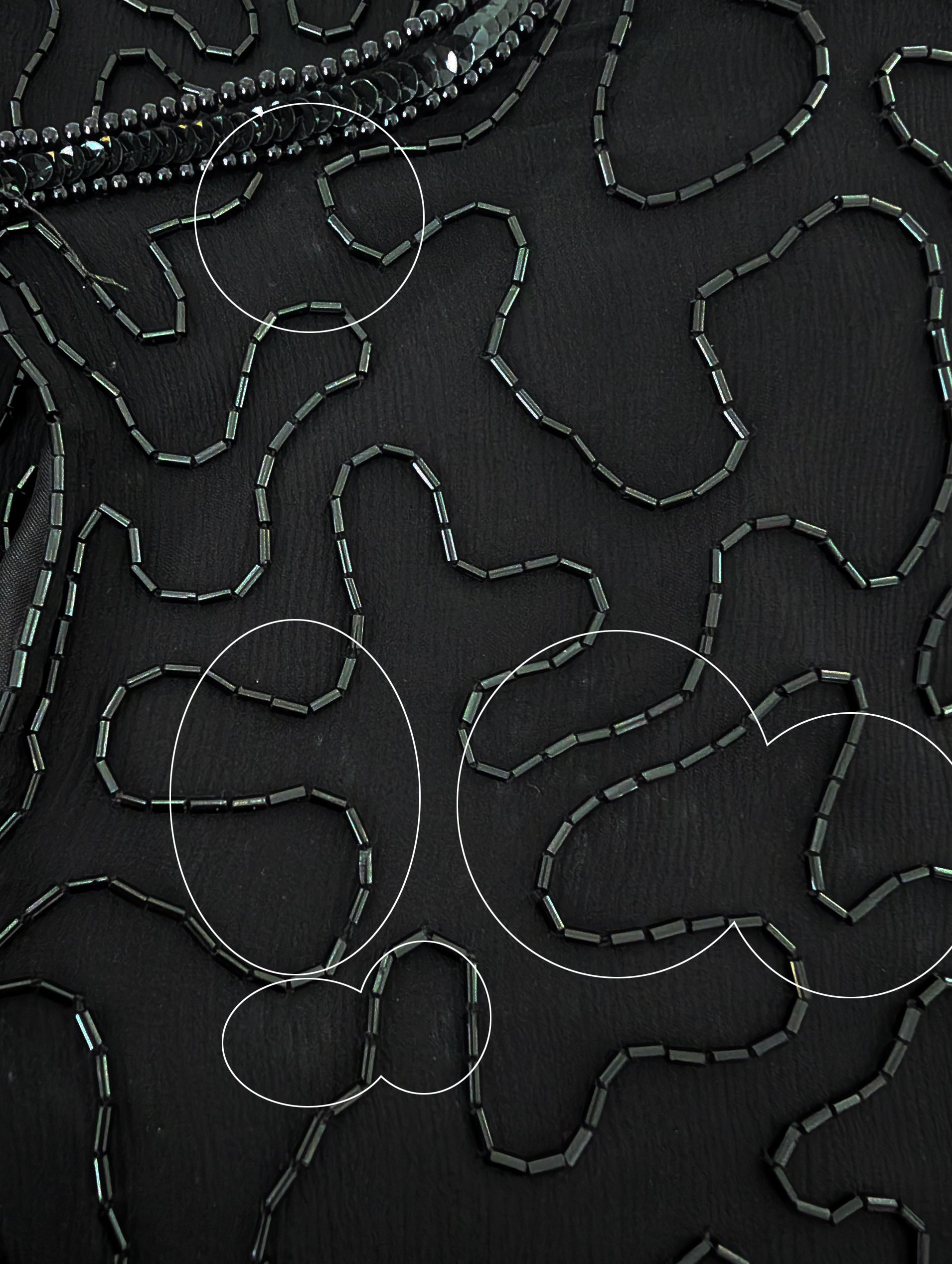 close up of the right shoulder area which has some light spots that didn't come out during cleaning