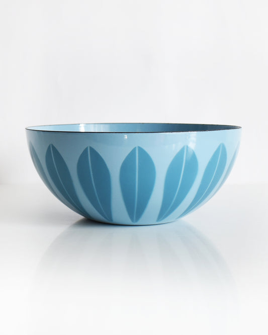 a vintage 1960s Cathrineholm lotus bowl against a white background