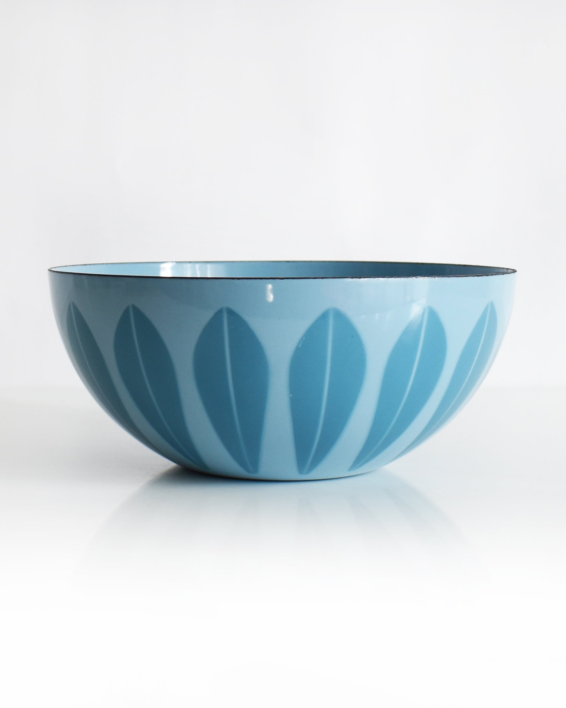 a vintage 1960s Cathrineholm lotus bowl against a white background