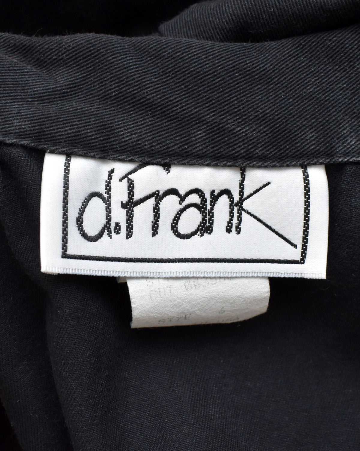 Close-up of the 'd.frank' tag