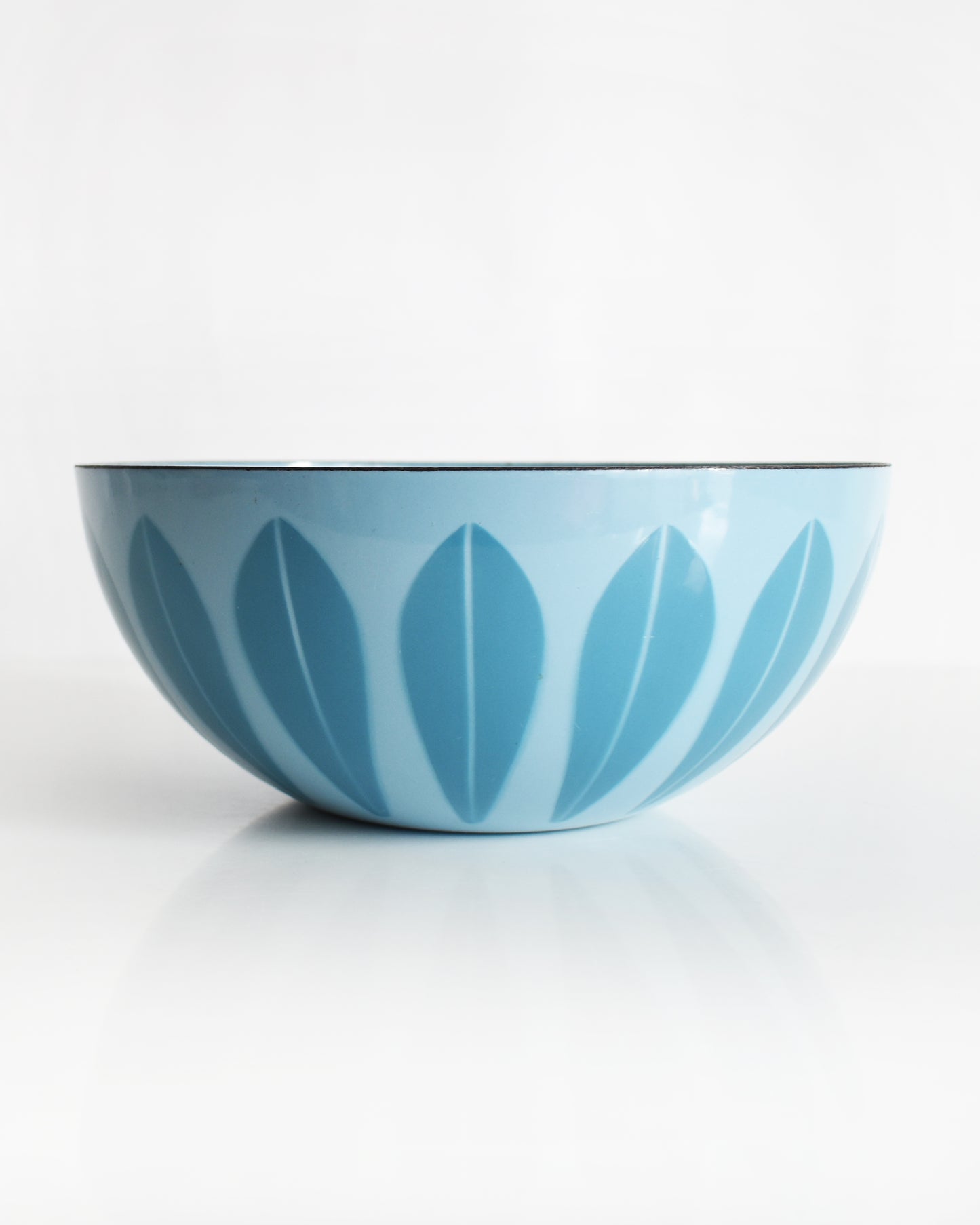 a vintage 1960s Cathrineholm lotus bowl against a white background