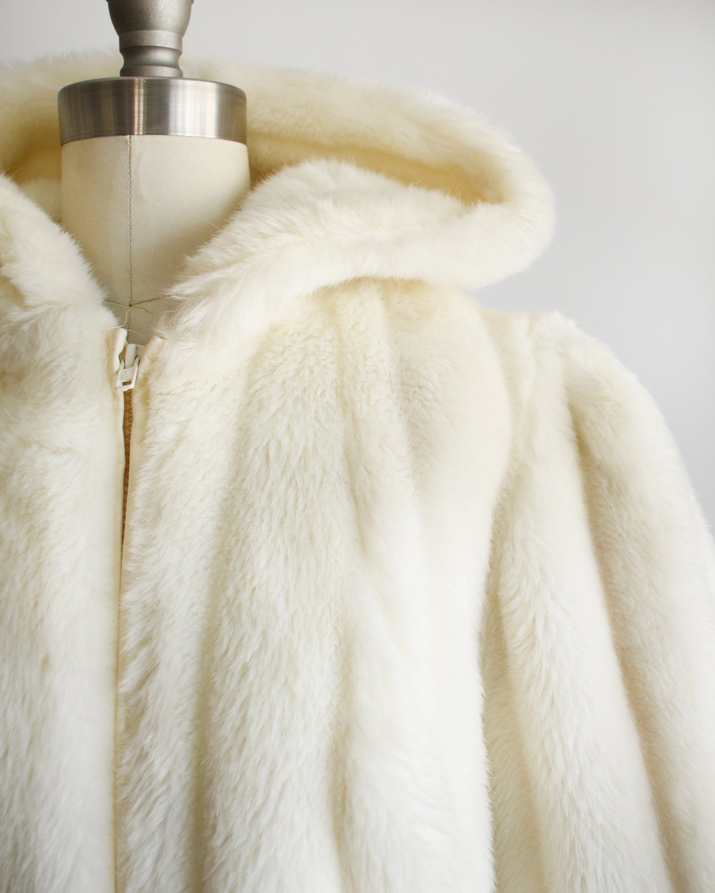 close up of the plush faux fur on the shoulder of the coat.