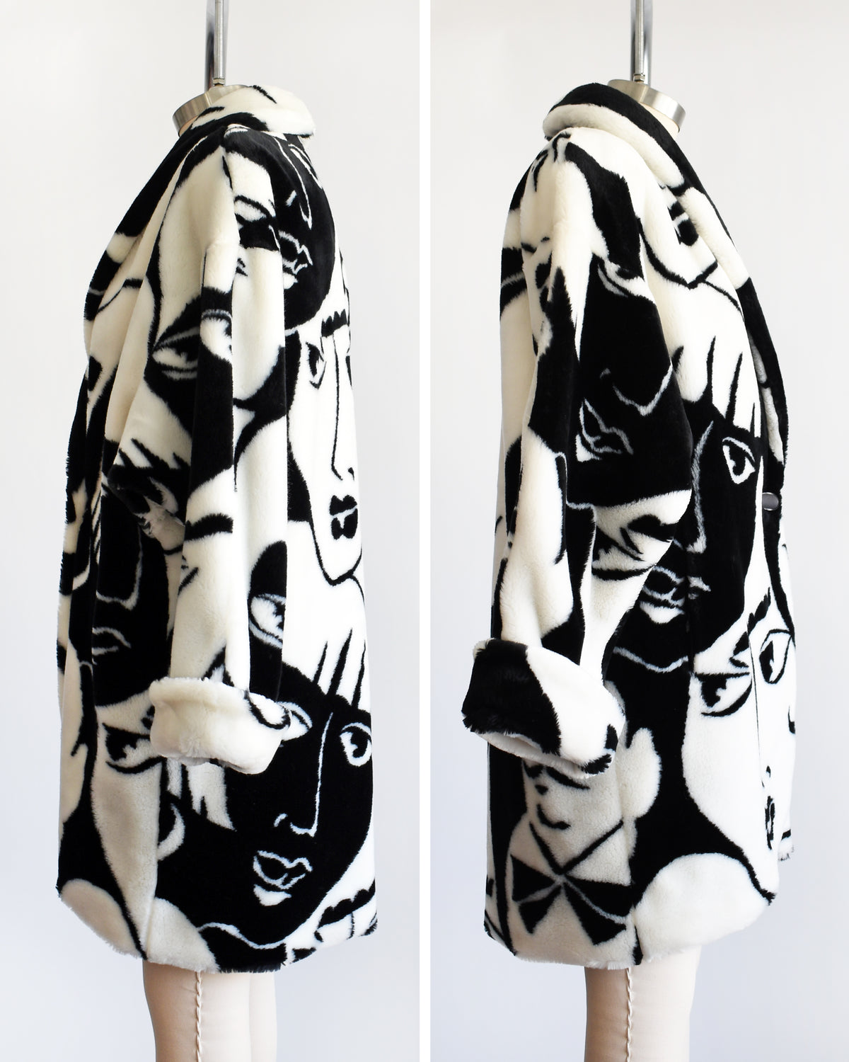 side by side views of the side of a vintage 1980s Donnybrook black and white graphic face patterned plush coat displayed on a mannequin against a plain white background.