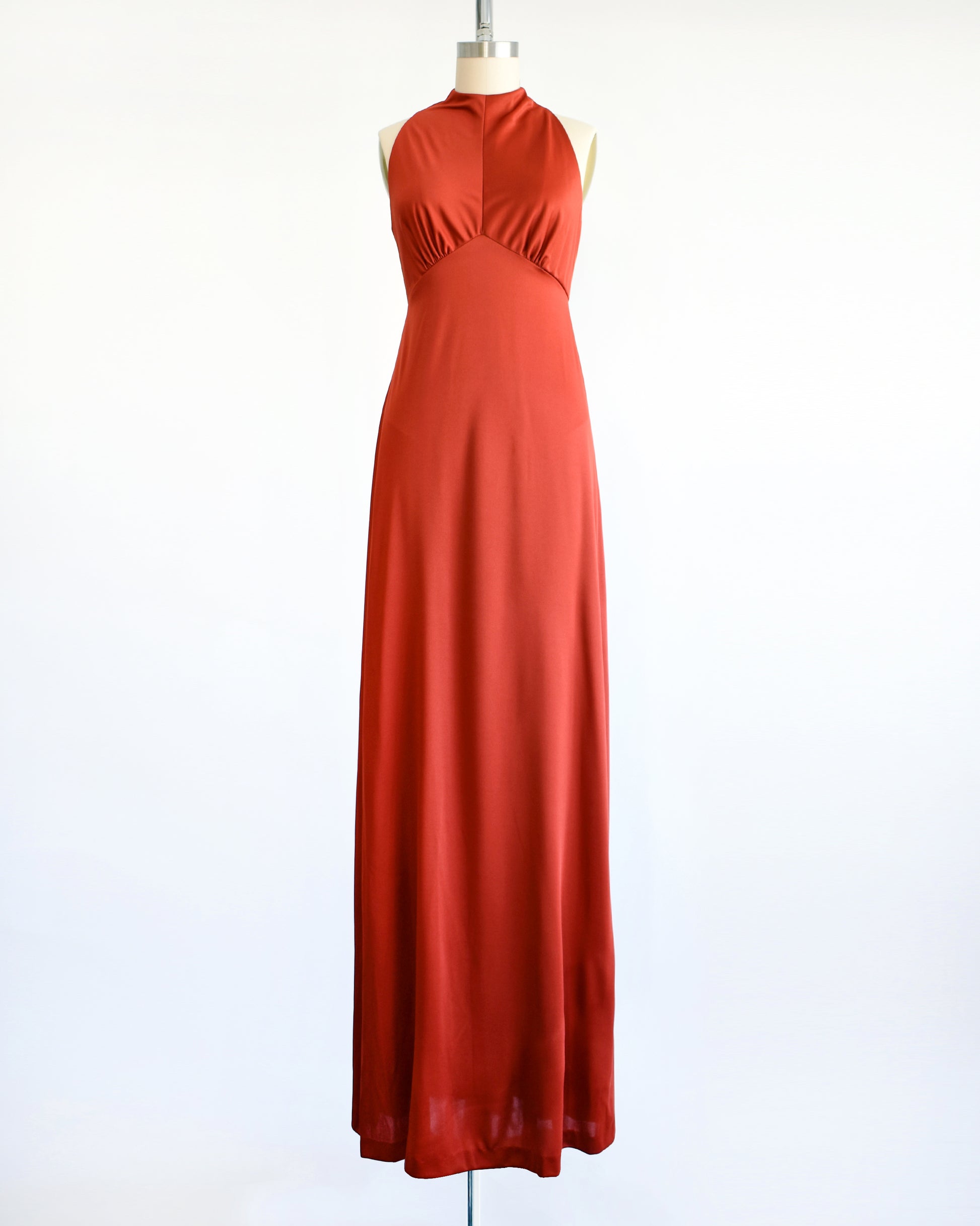 a vintage 1970s rust red maxi dress