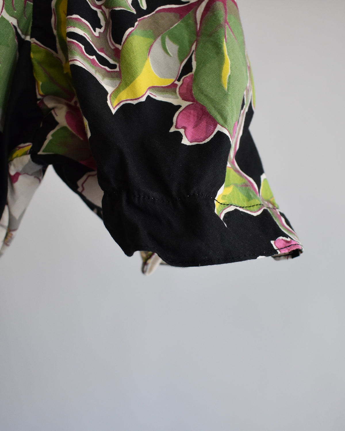 close up of the left sleeve cuff that has lost elasticity 