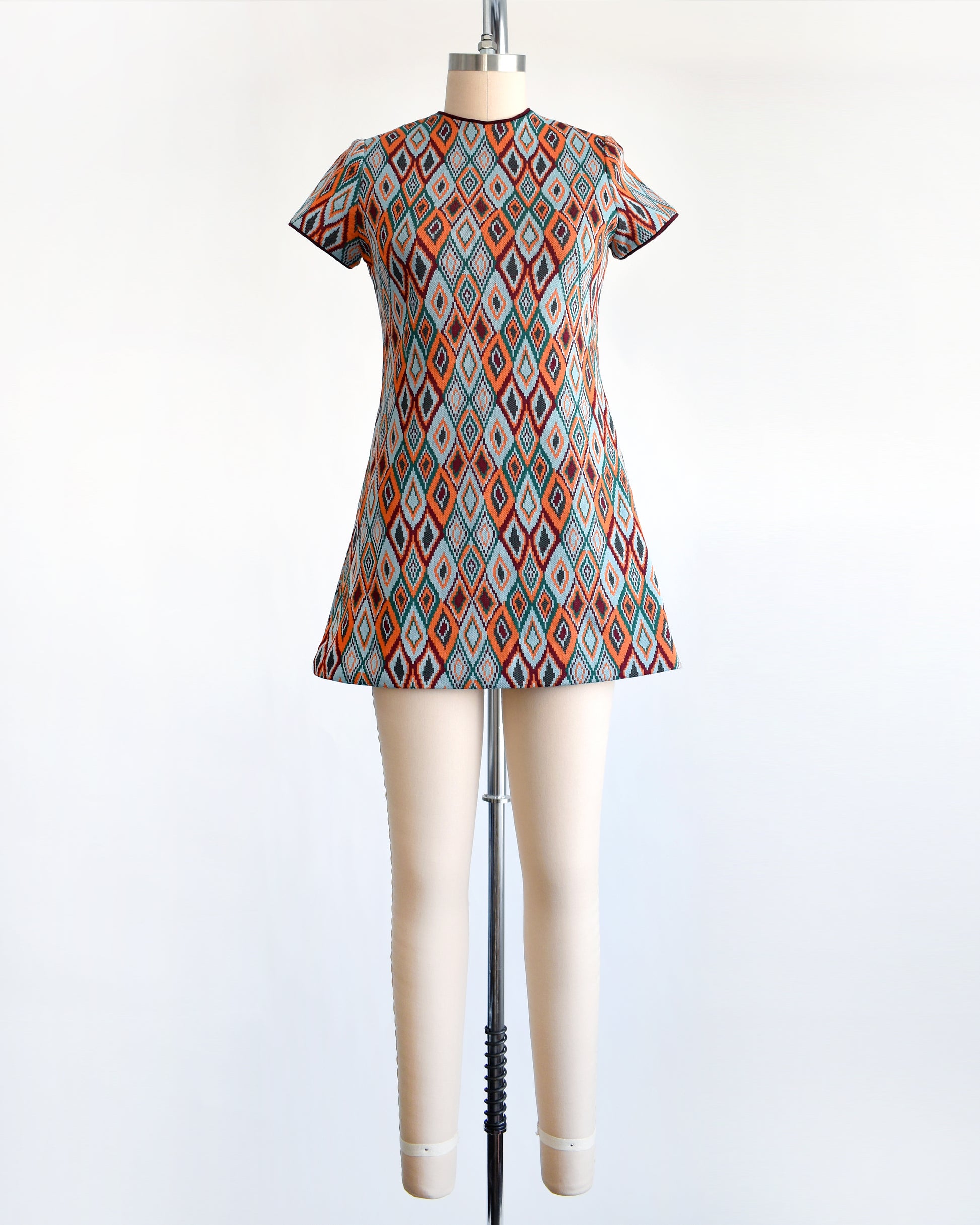 a vintage 1970s diamond print mod dress