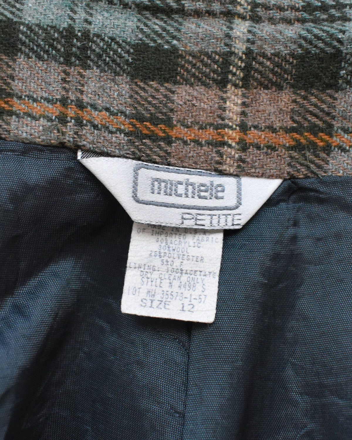 close up of the michele petite tag