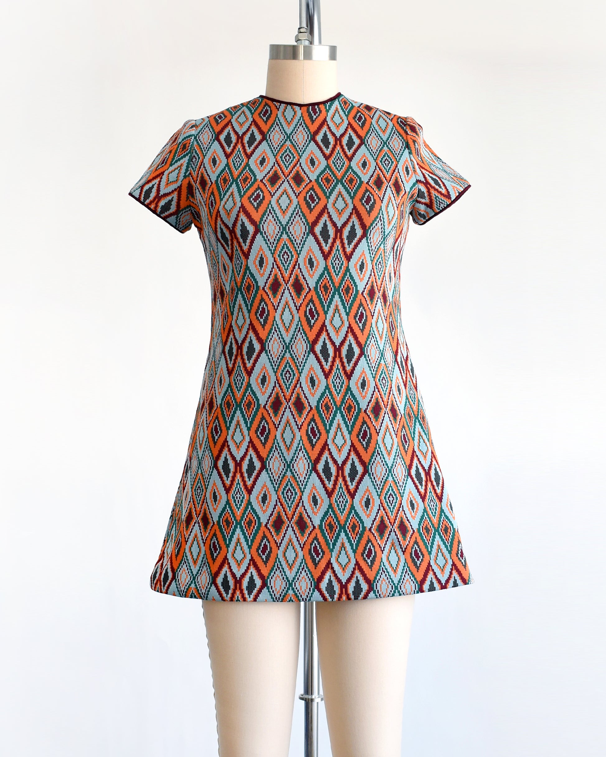 a vintage 1970s diamond print mod dress