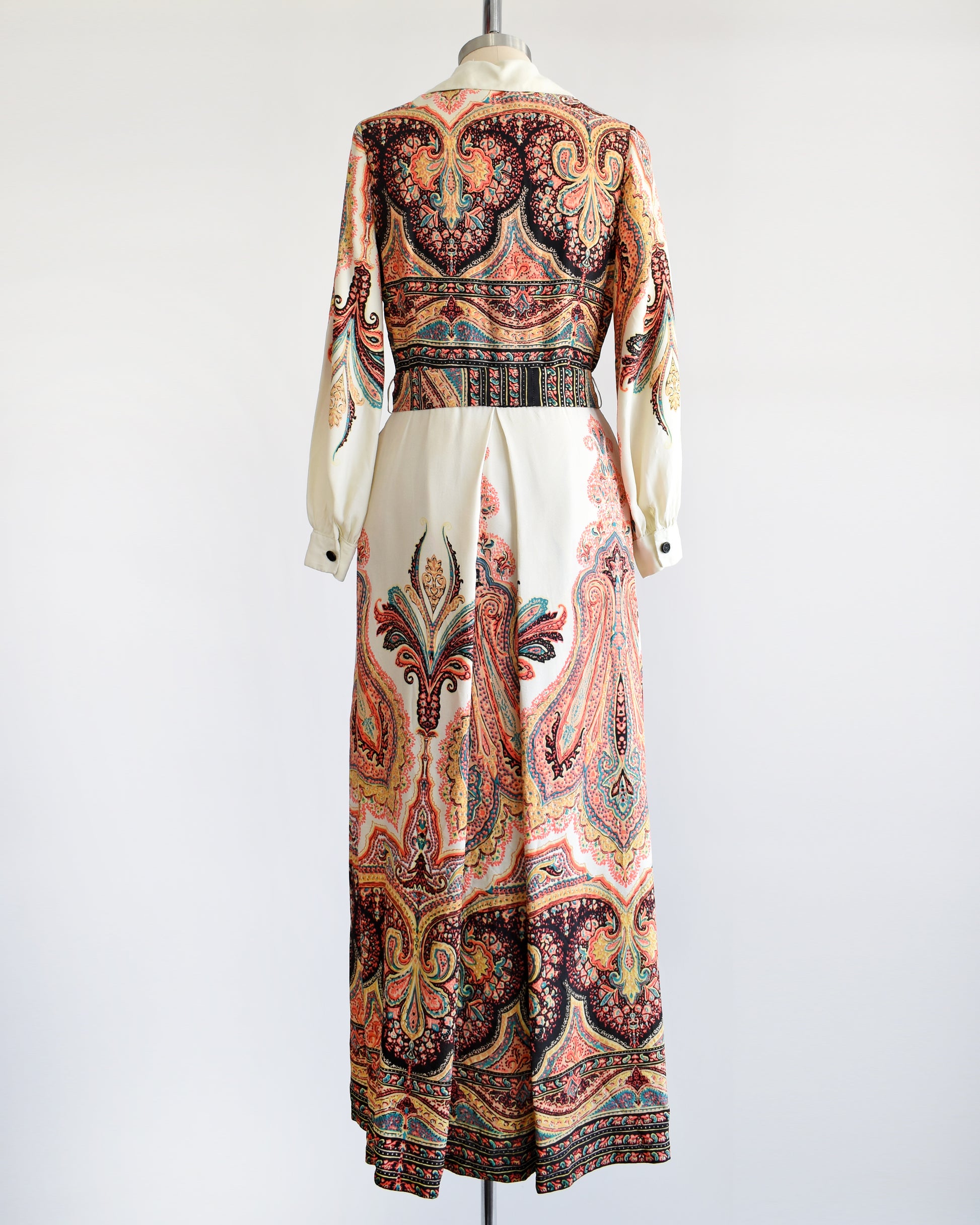 Back view of a vintage 1970s psychedelic paisley maxi dress 