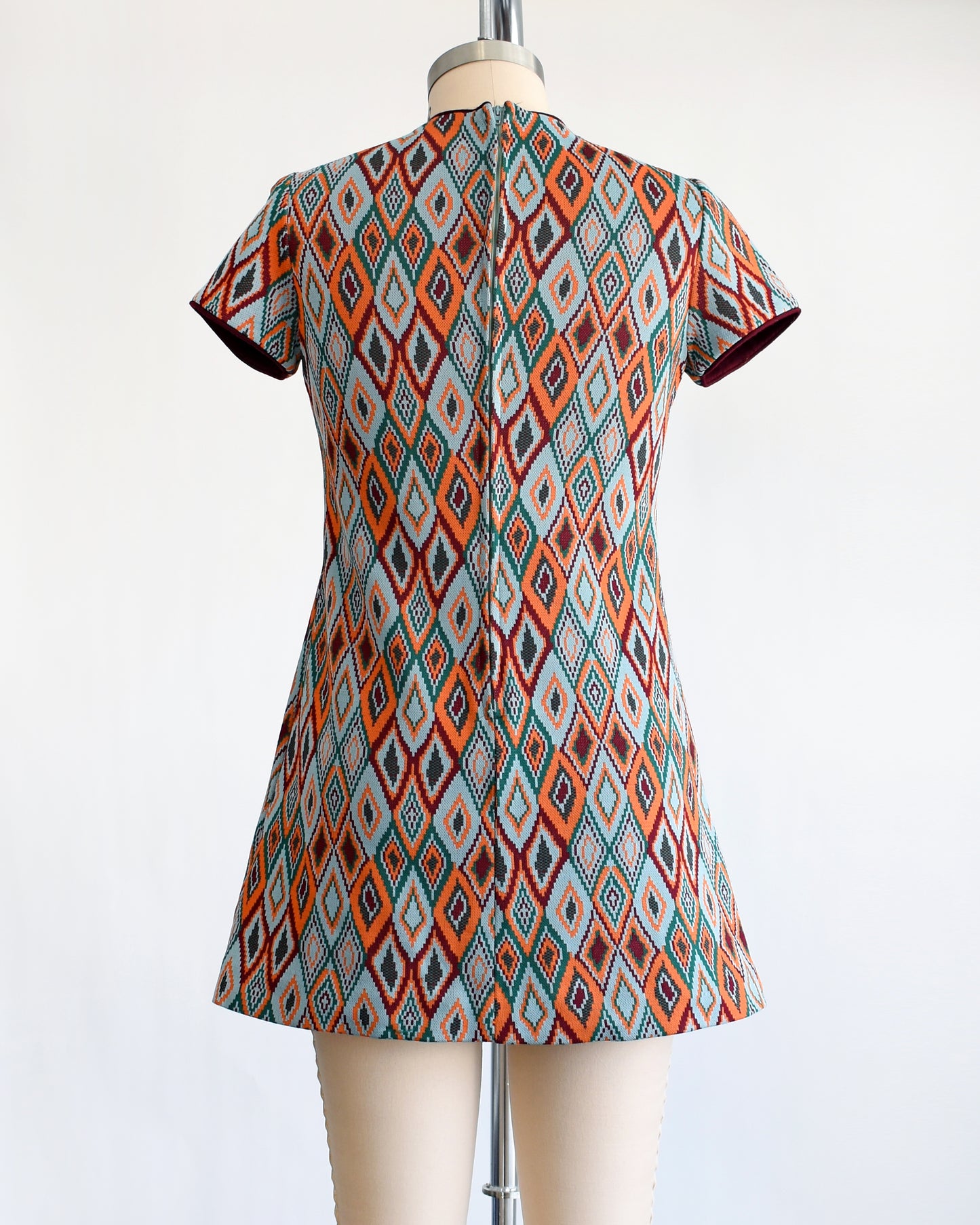 back view of a vintage 1970s diamond print mod dress