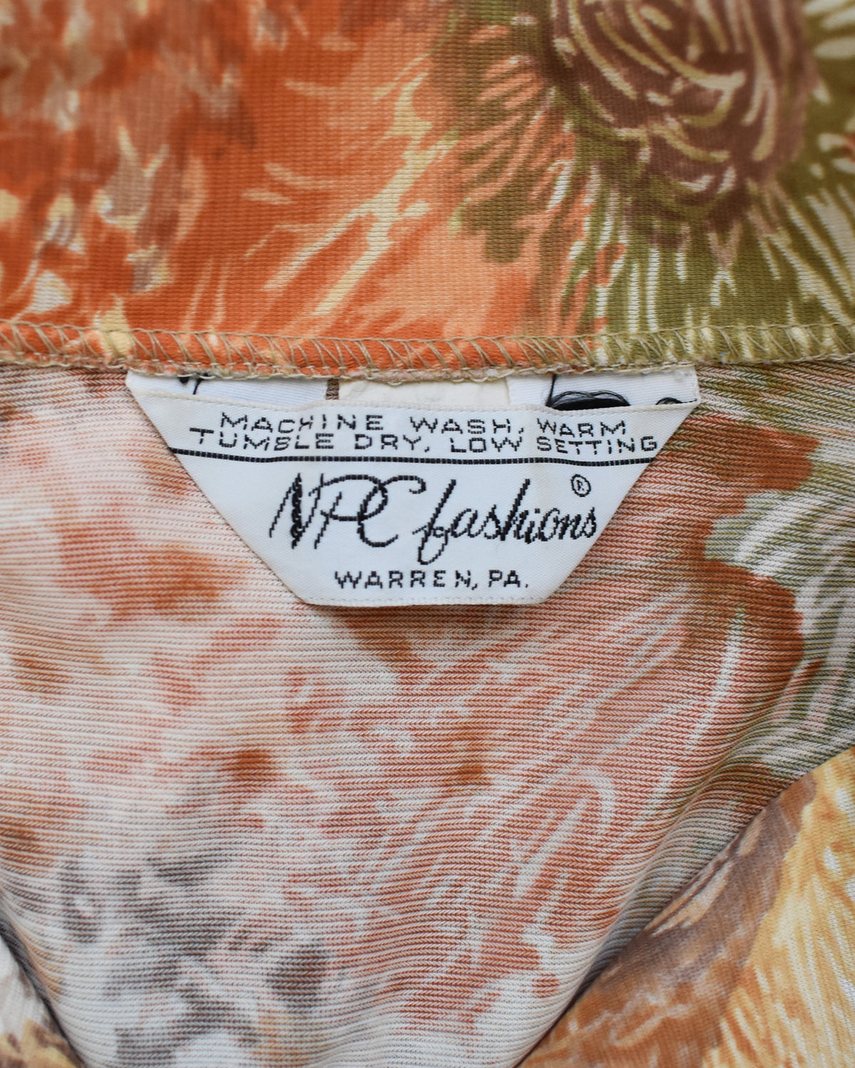 close up of the NPC fashions tag