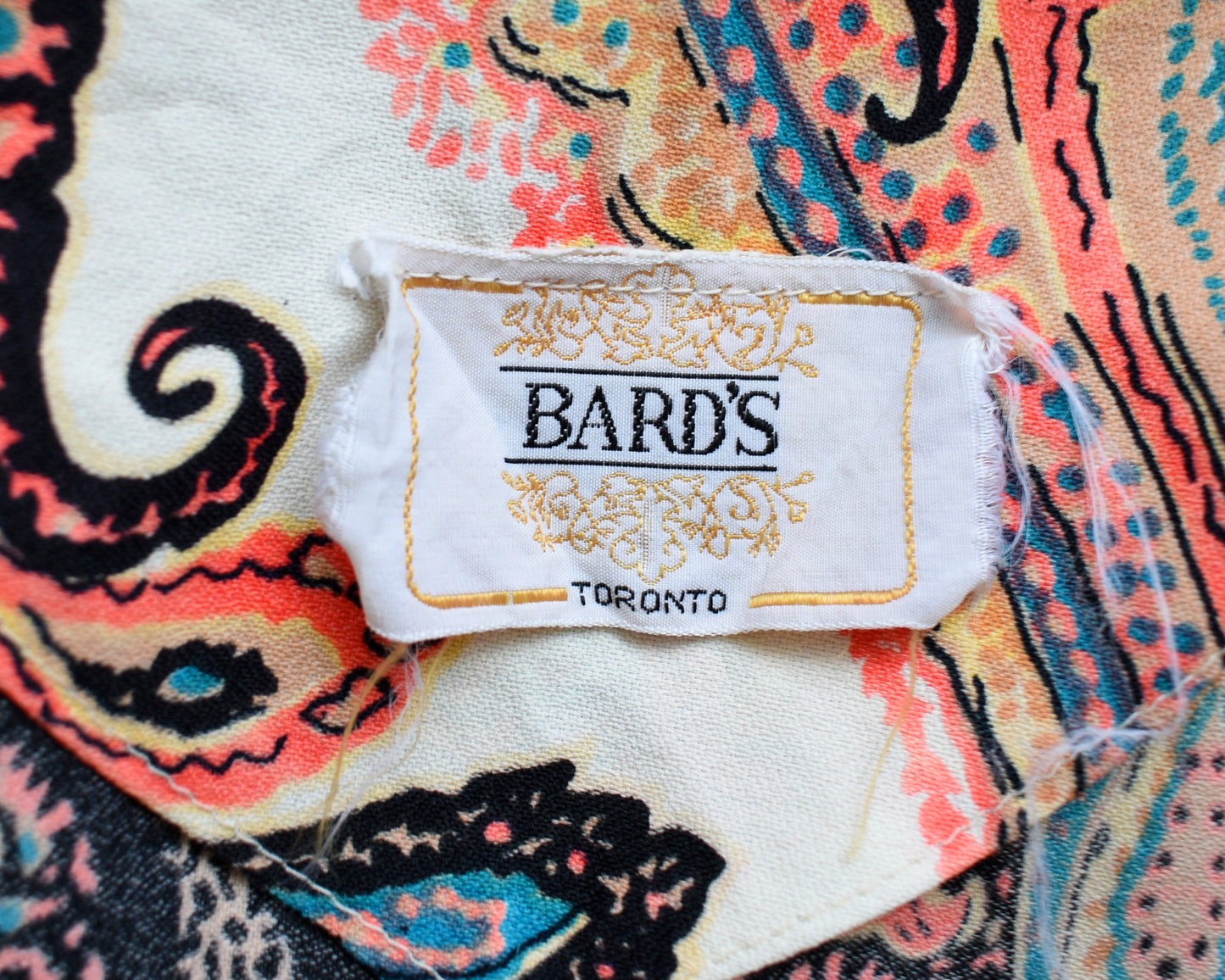 A close up of the tag that says Bard's Toronto