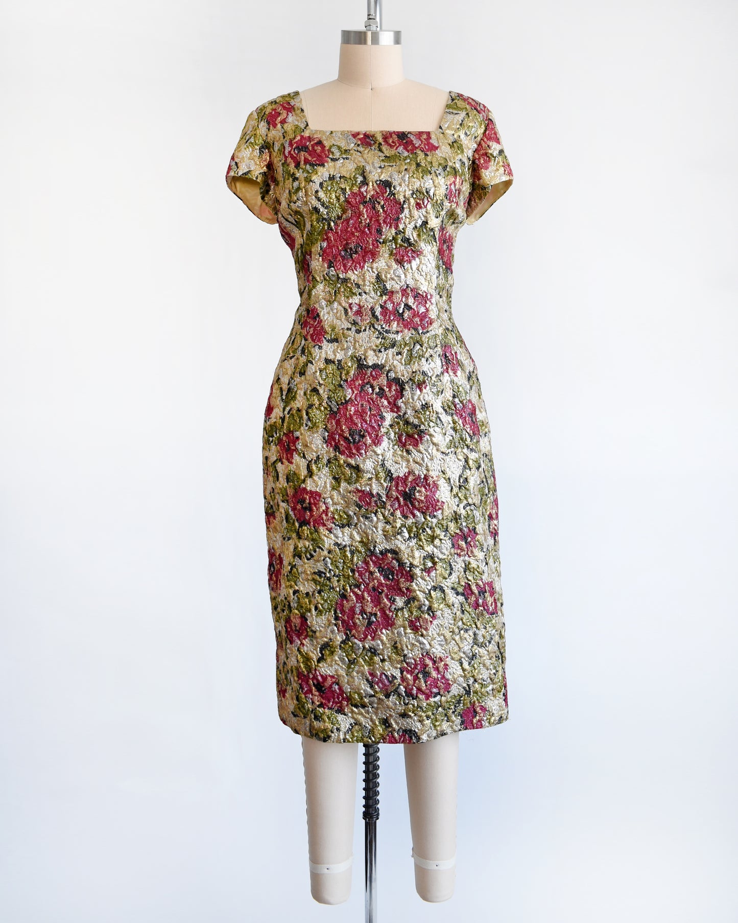 A vintage 1960s floral metallic brocade dress.