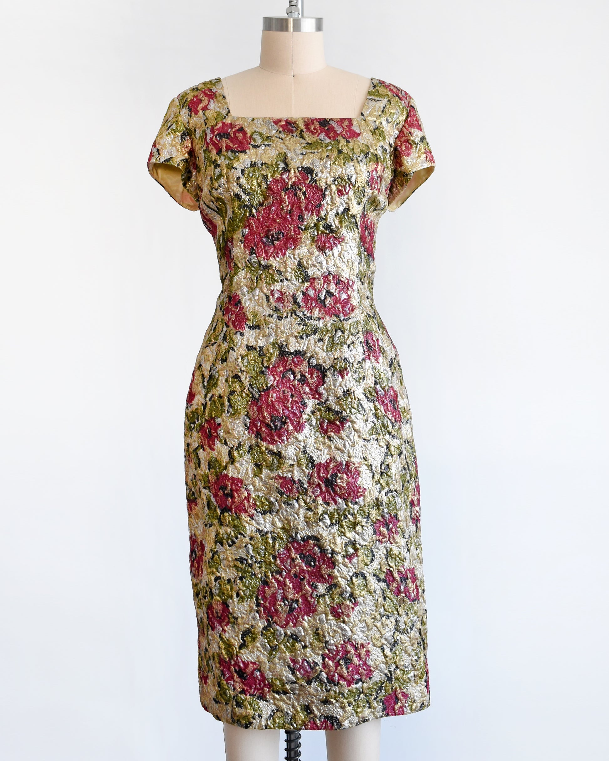 A vintage 1960s floral metallic brocade dress.