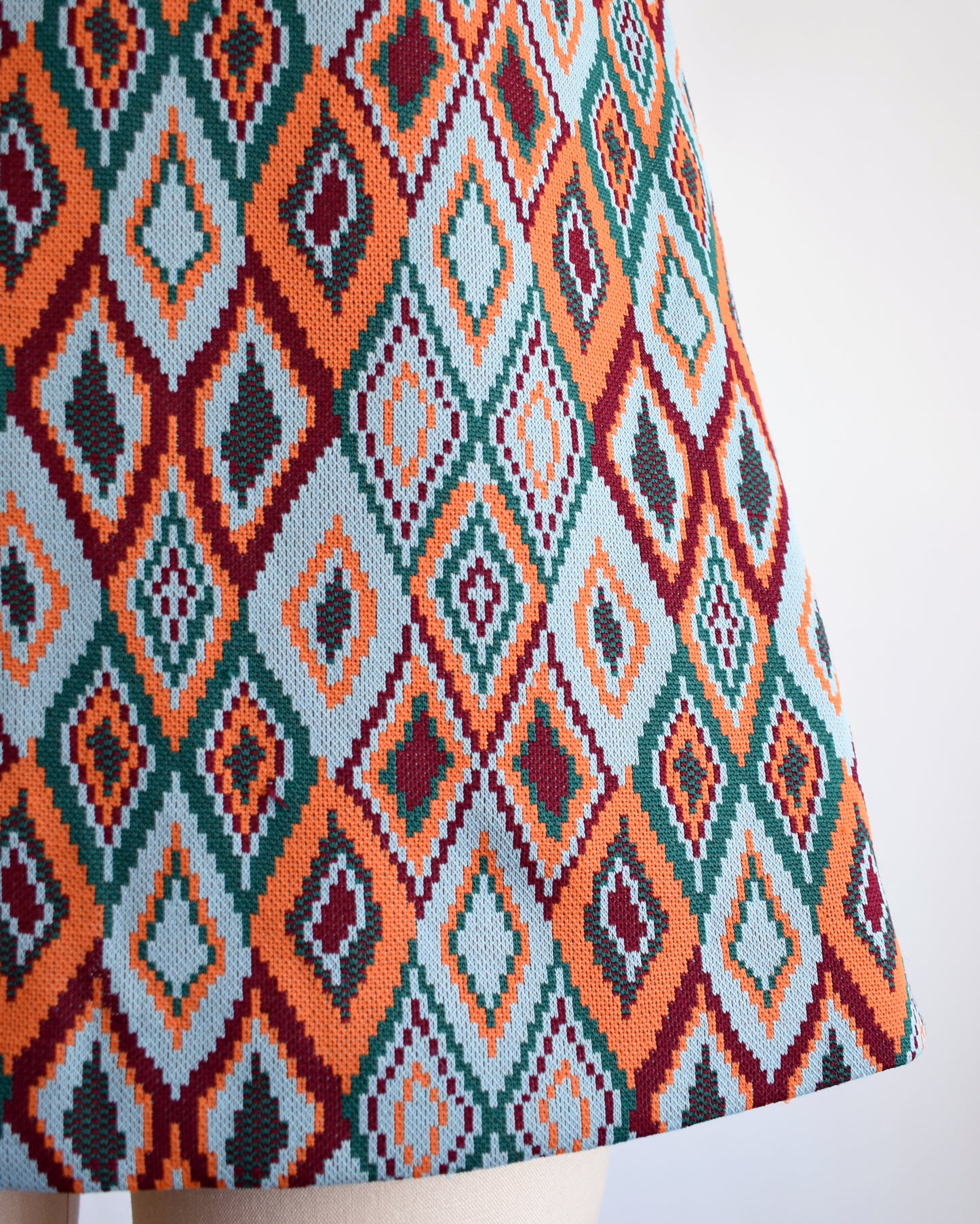 close up of the diamond print on the vintage 1970s mod mini dress