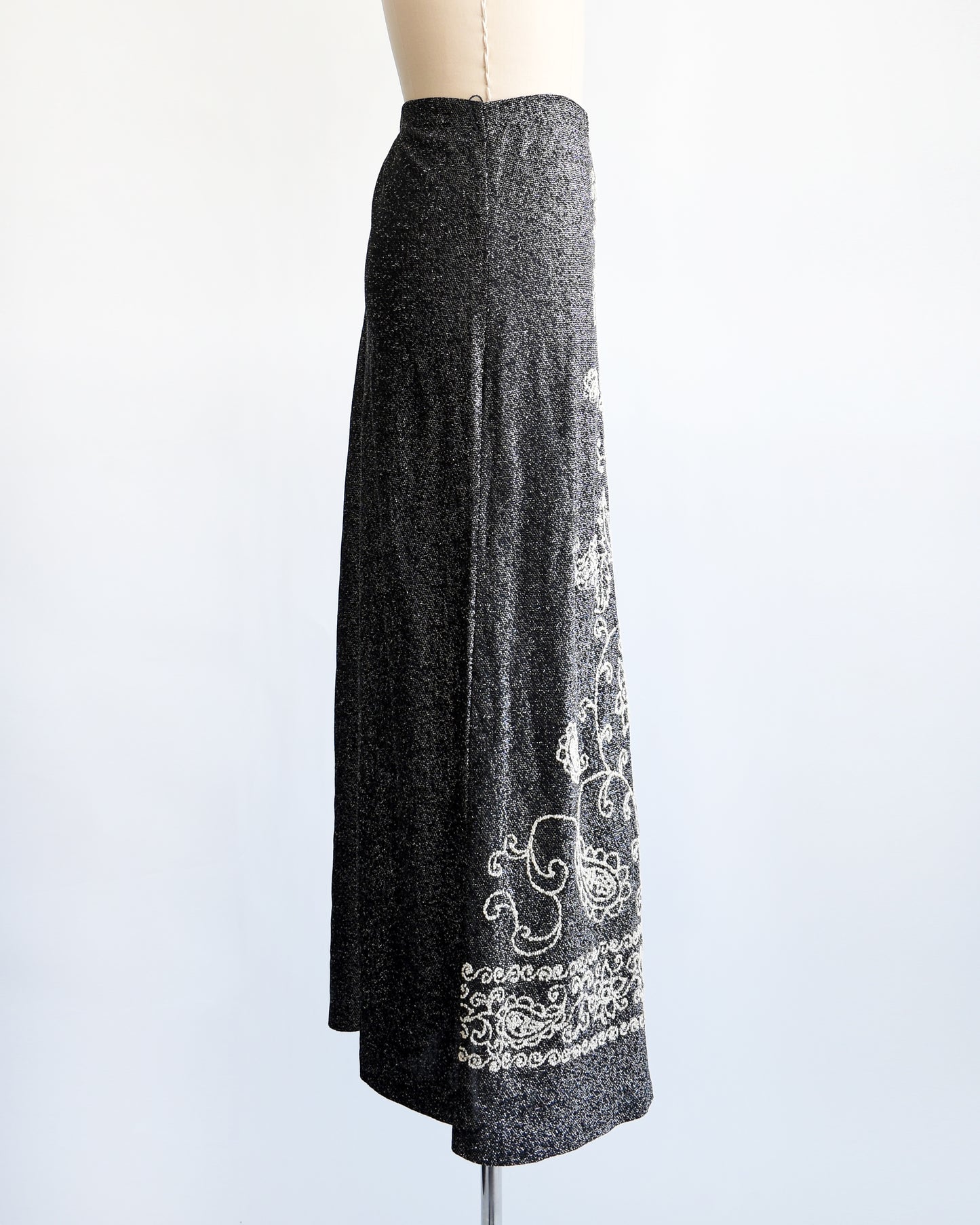 side front view of a vintage 1970s black and silver beaded maxi skirt