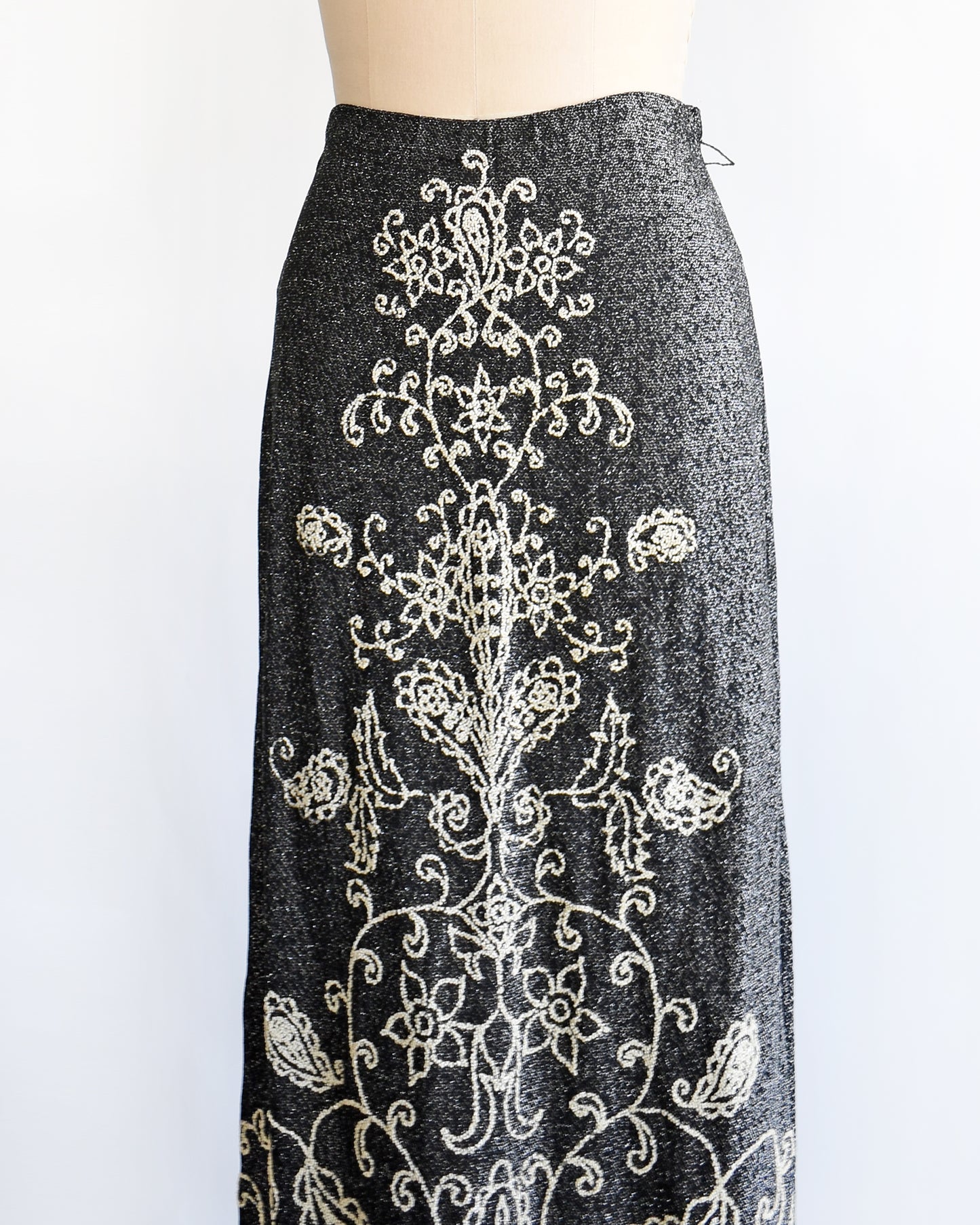 side front view of a vintage 1970s black and silver beaded maxi skirt