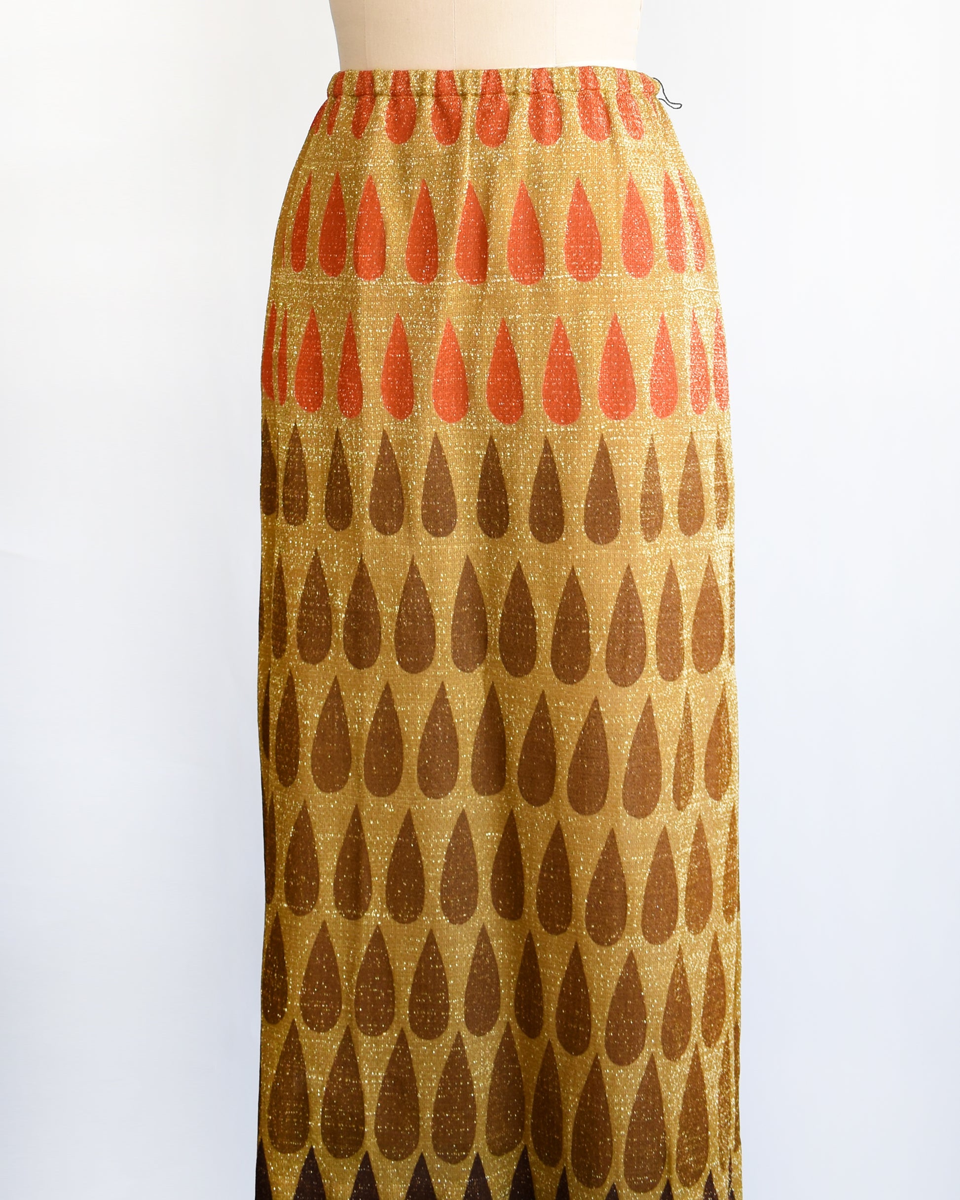 side front view of a vintage 1970 metallic teardrop skirt by Nelly de Grab