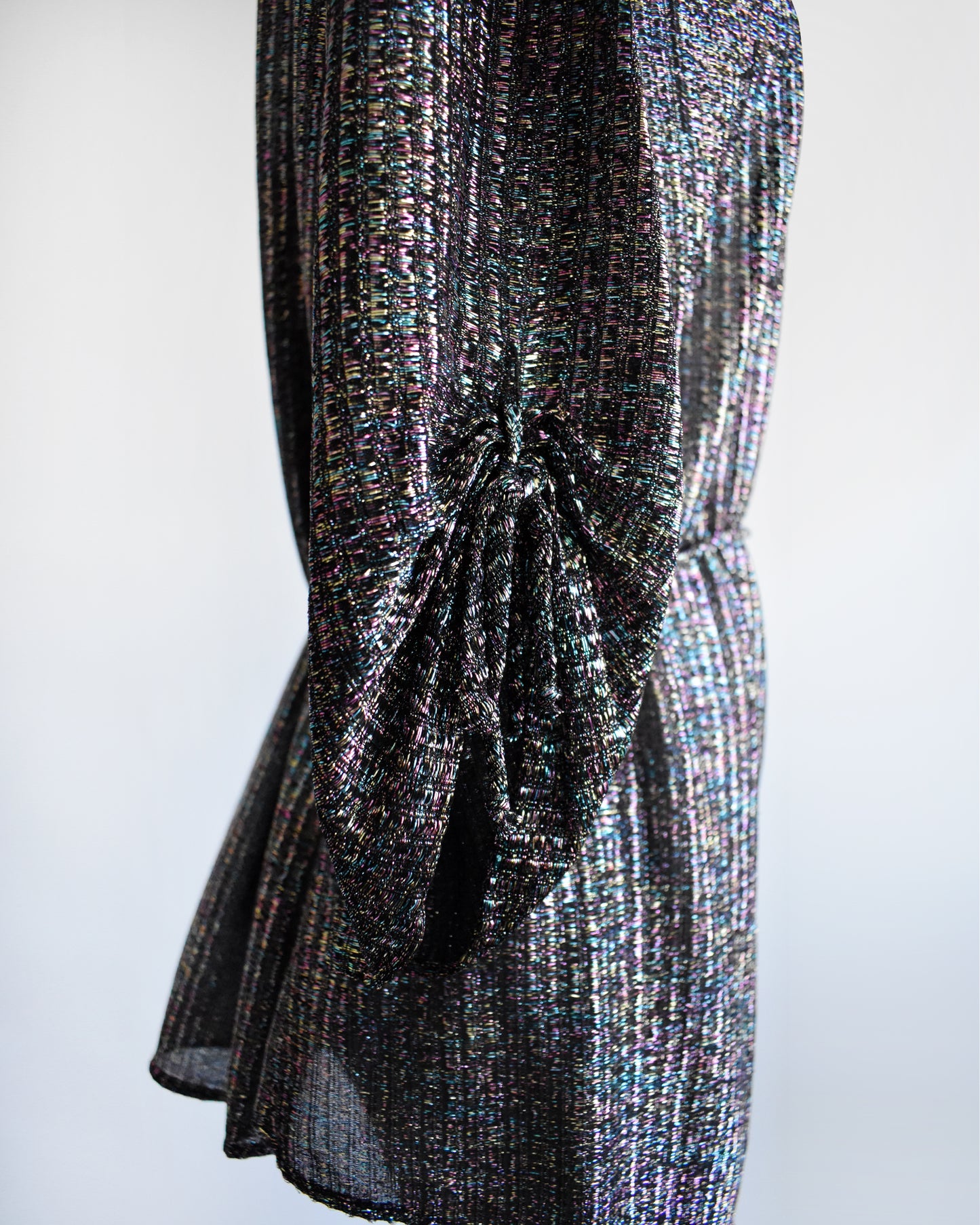 close up of the sides of the ruched half sleeves