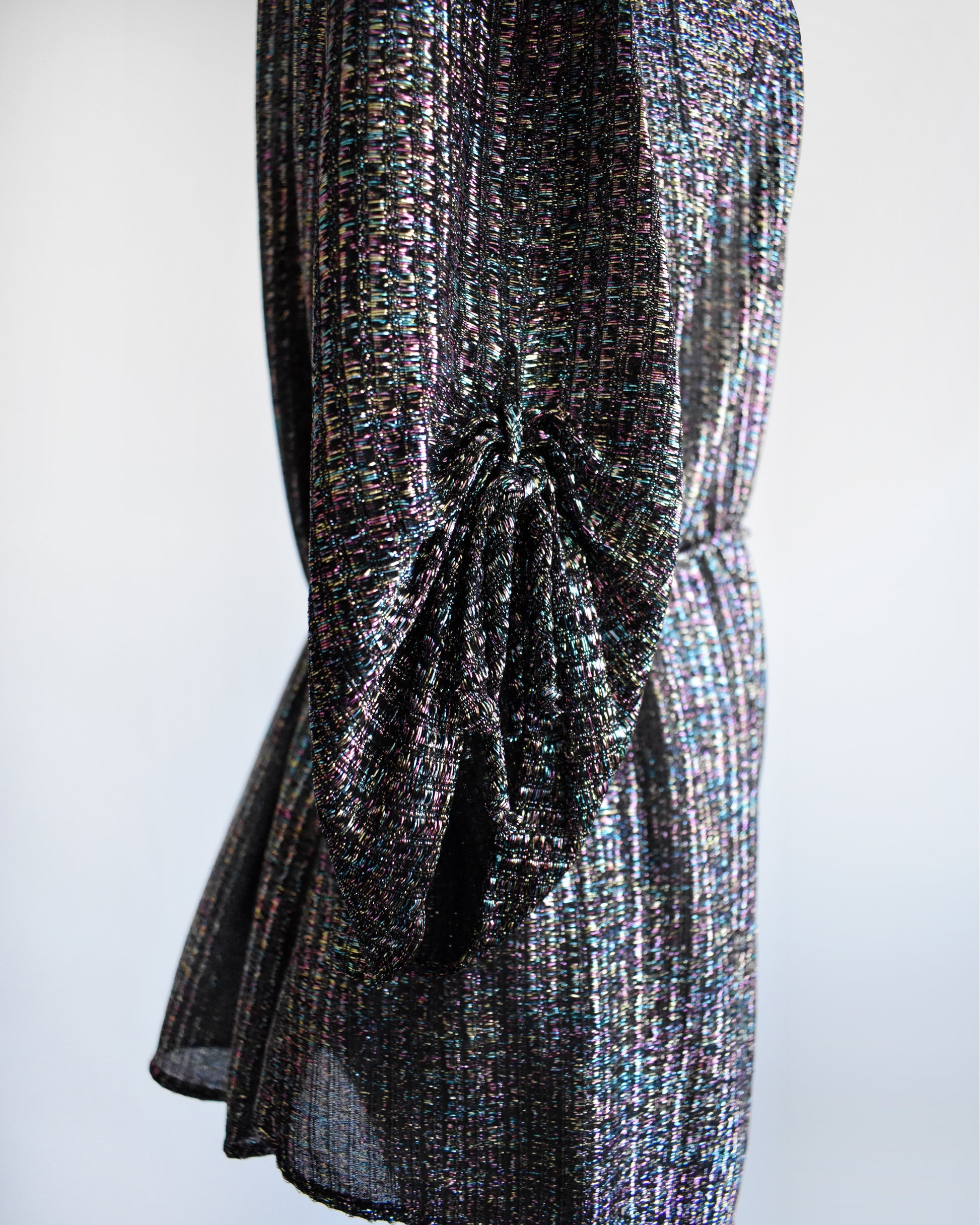 close up of the sides of the ruched half sleeves