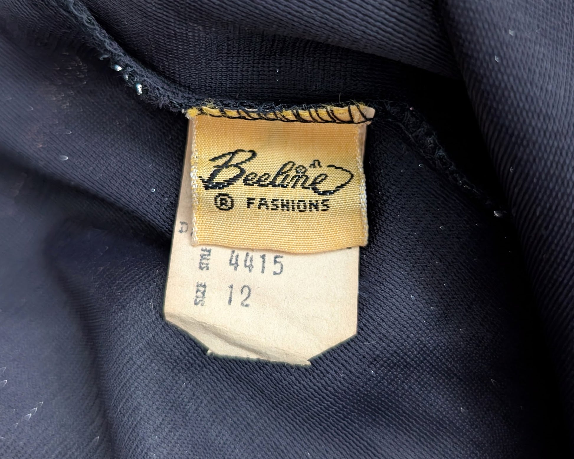 close up of the tag which says Beeline fashions