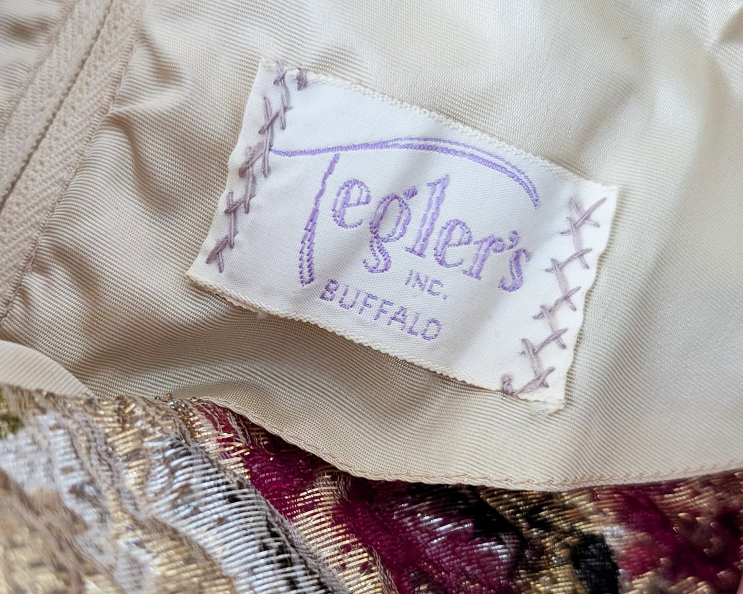 close up of the dress tag which says Tegler's INC. Buffalo