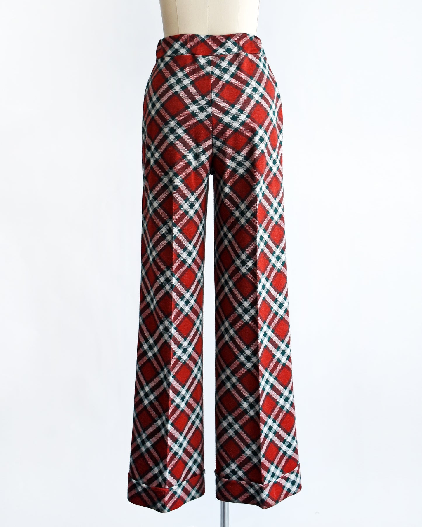 back view of a pair of vintage 1970s red, green, and white plaid wide leg pants