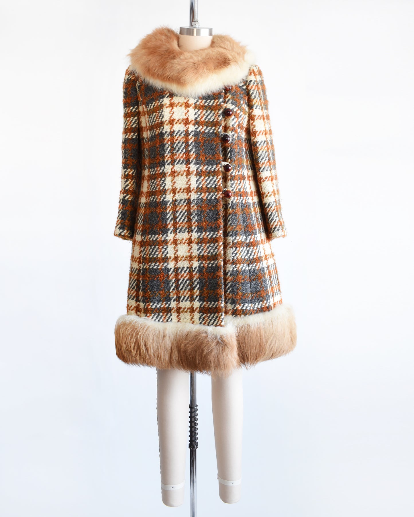 a vintage 1960s plaid wool coat with guanaco fur trim