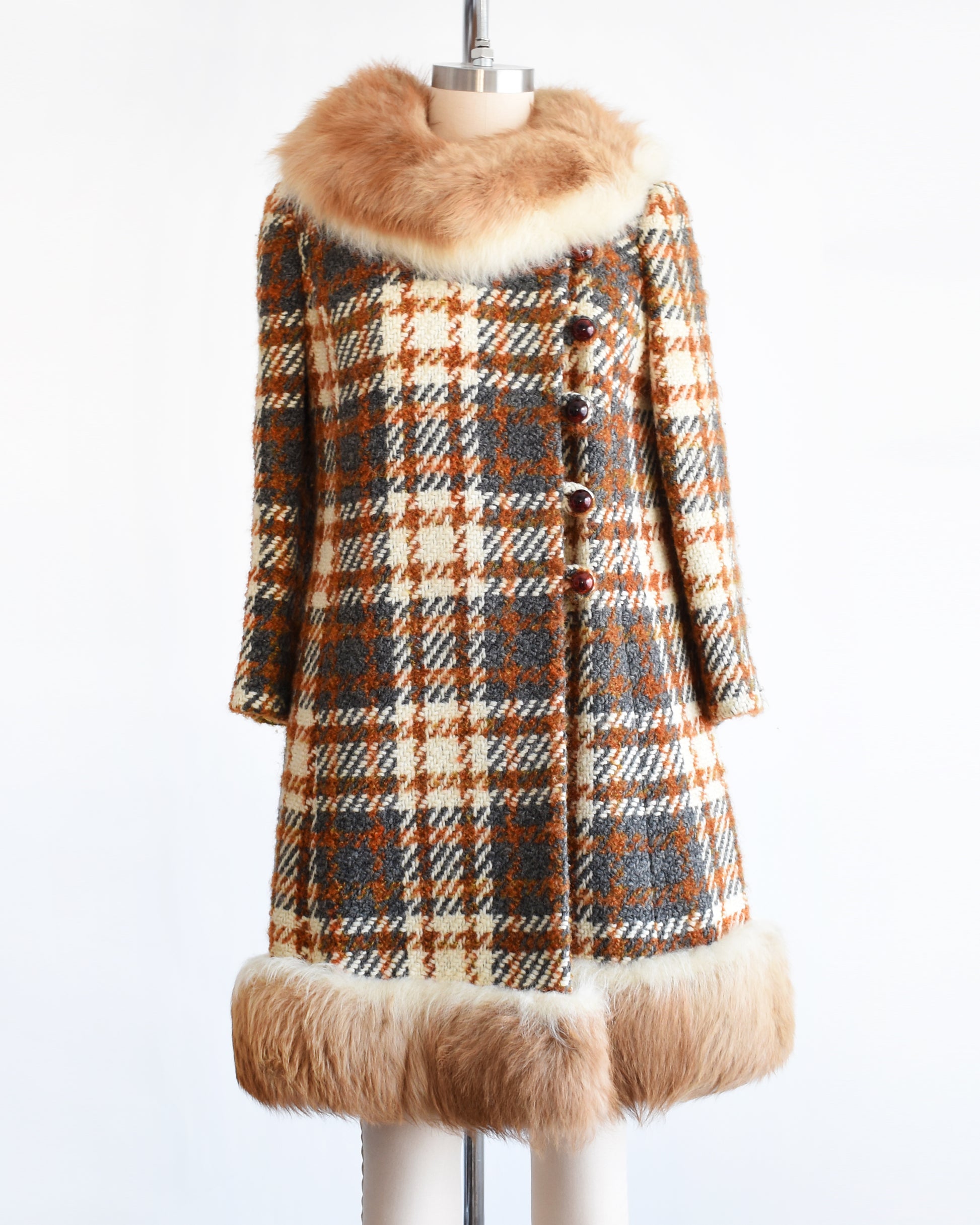 a vintage 1960s plaid wool coat with guanaco fur trim